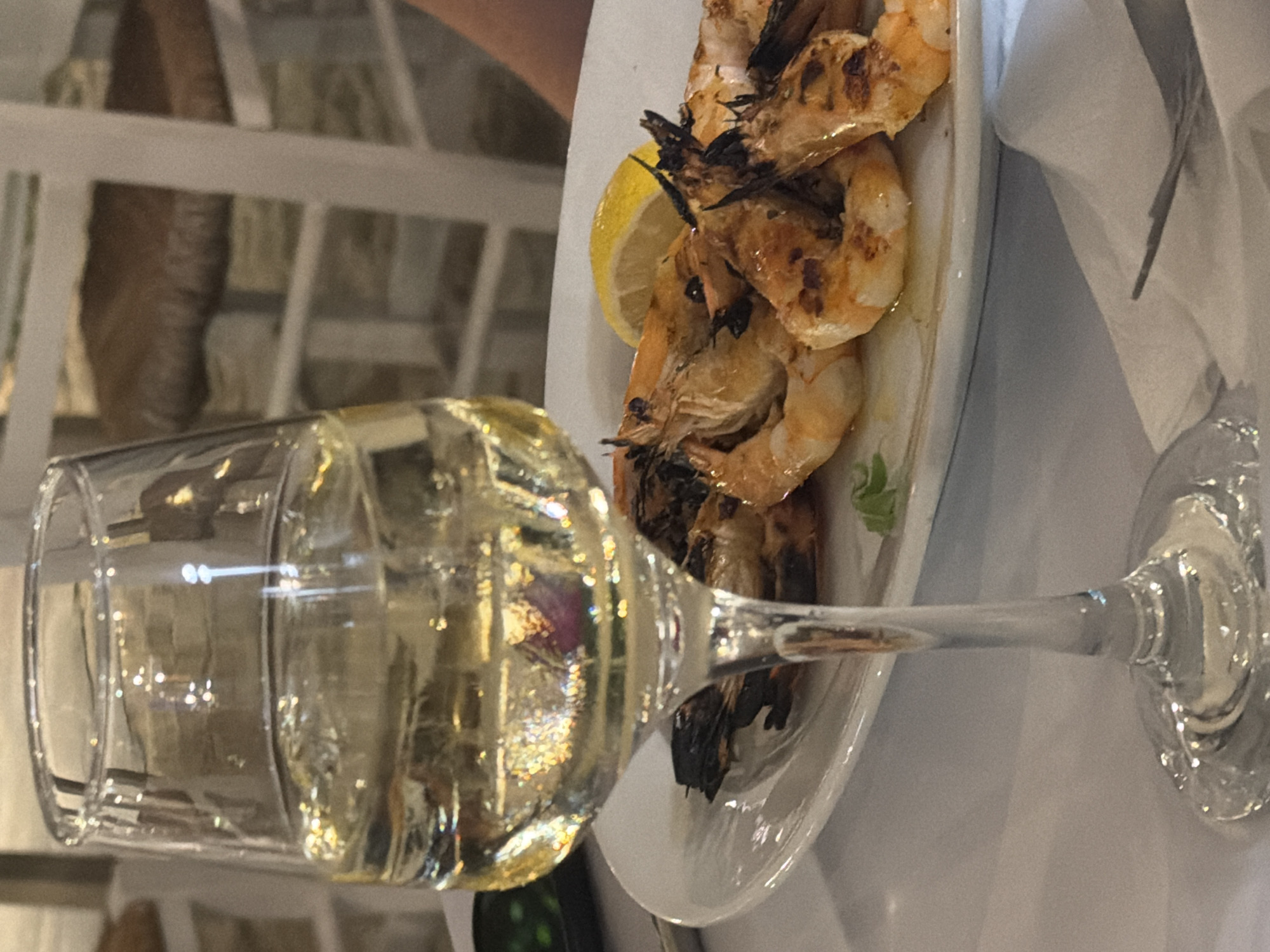 Seafood dinner and white wine on the Sithonia coast
