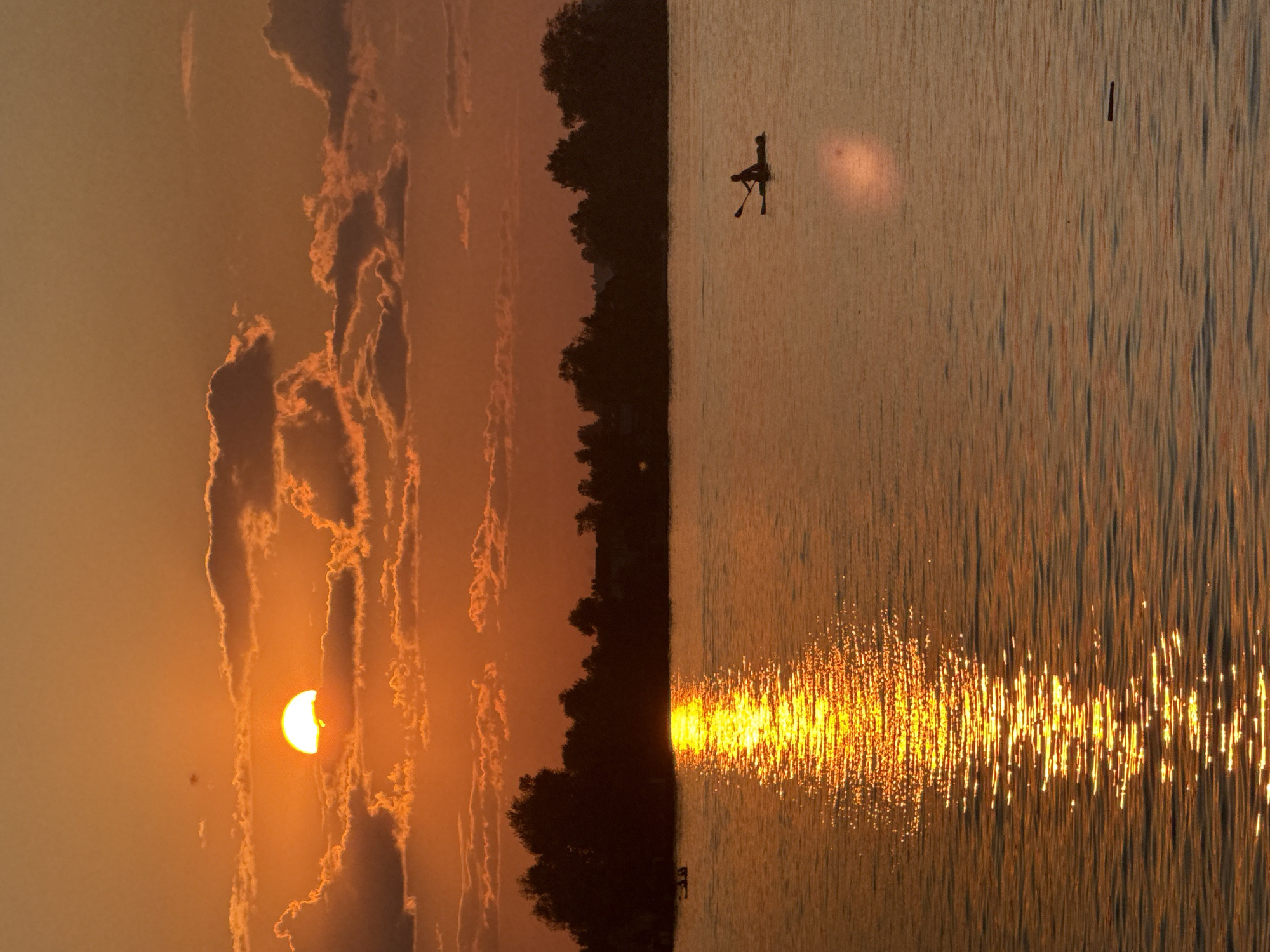 Summer evening at Votkinsk Reservoir: jet skis, fishing, and rollerblading at sunset