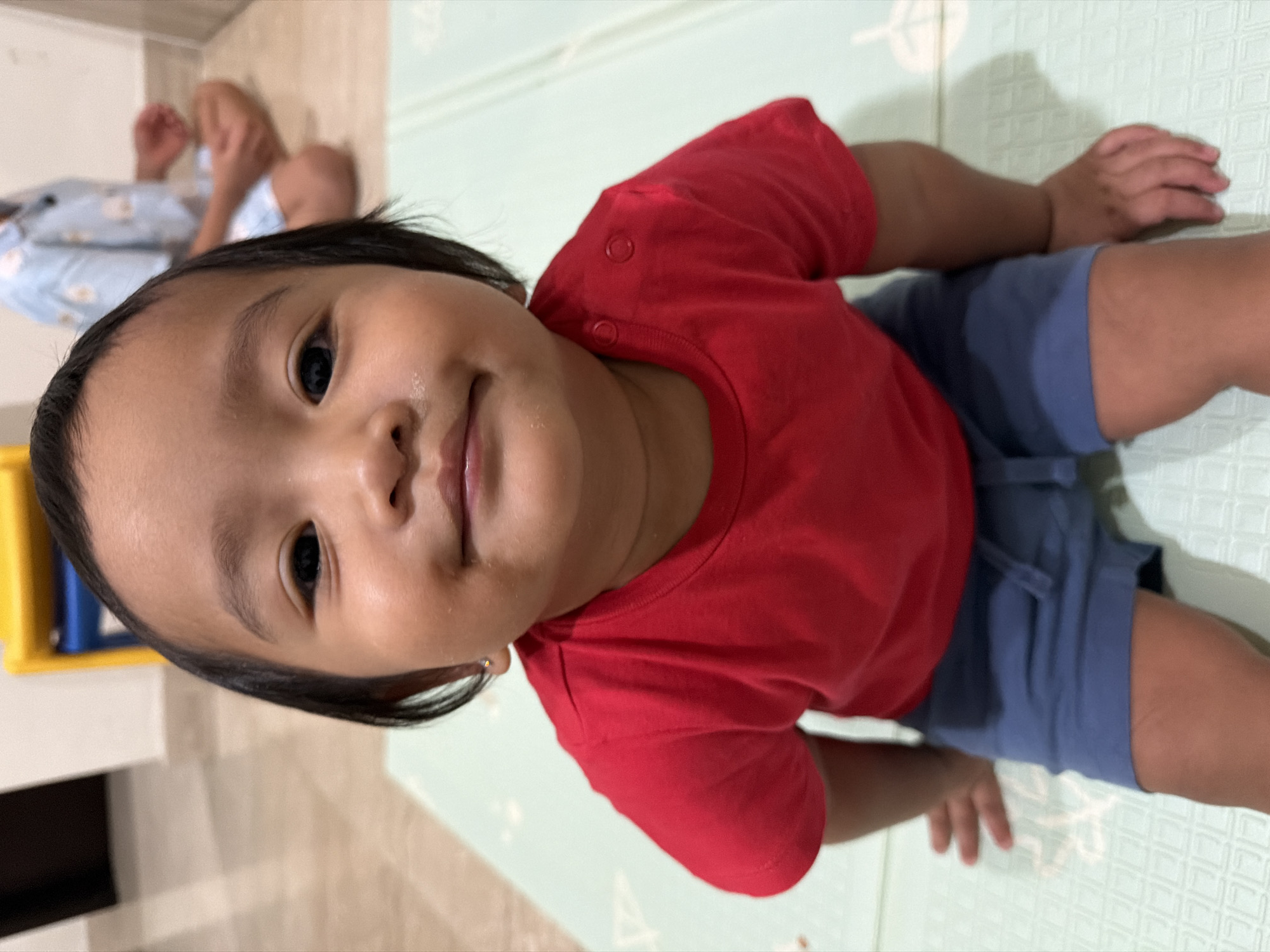 Indoor playtime and a street scene with police lights, Central Jakarta