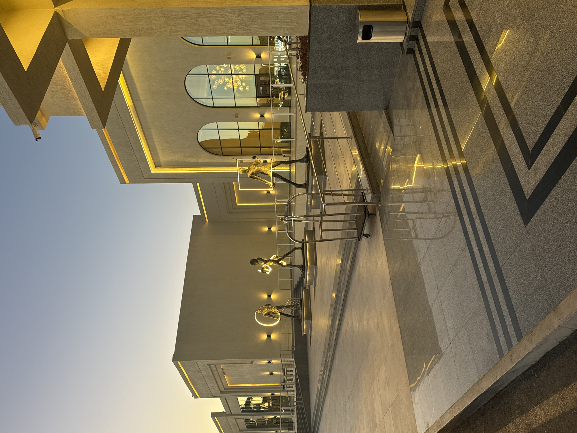 Golden hour illuminates modern plaza in Egypt