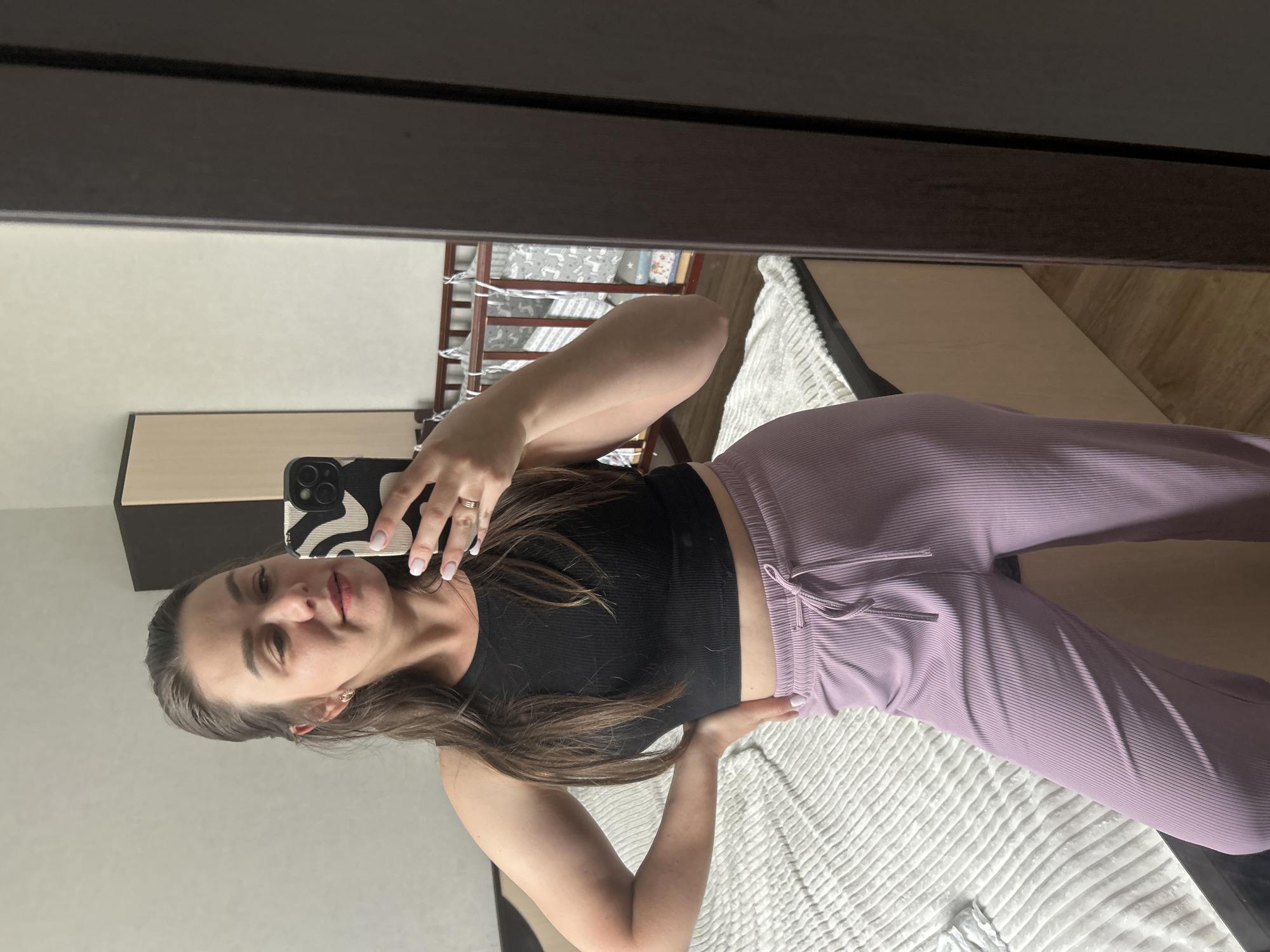 Woman takes bedroom selfies in Chaikovsky, child also photographed