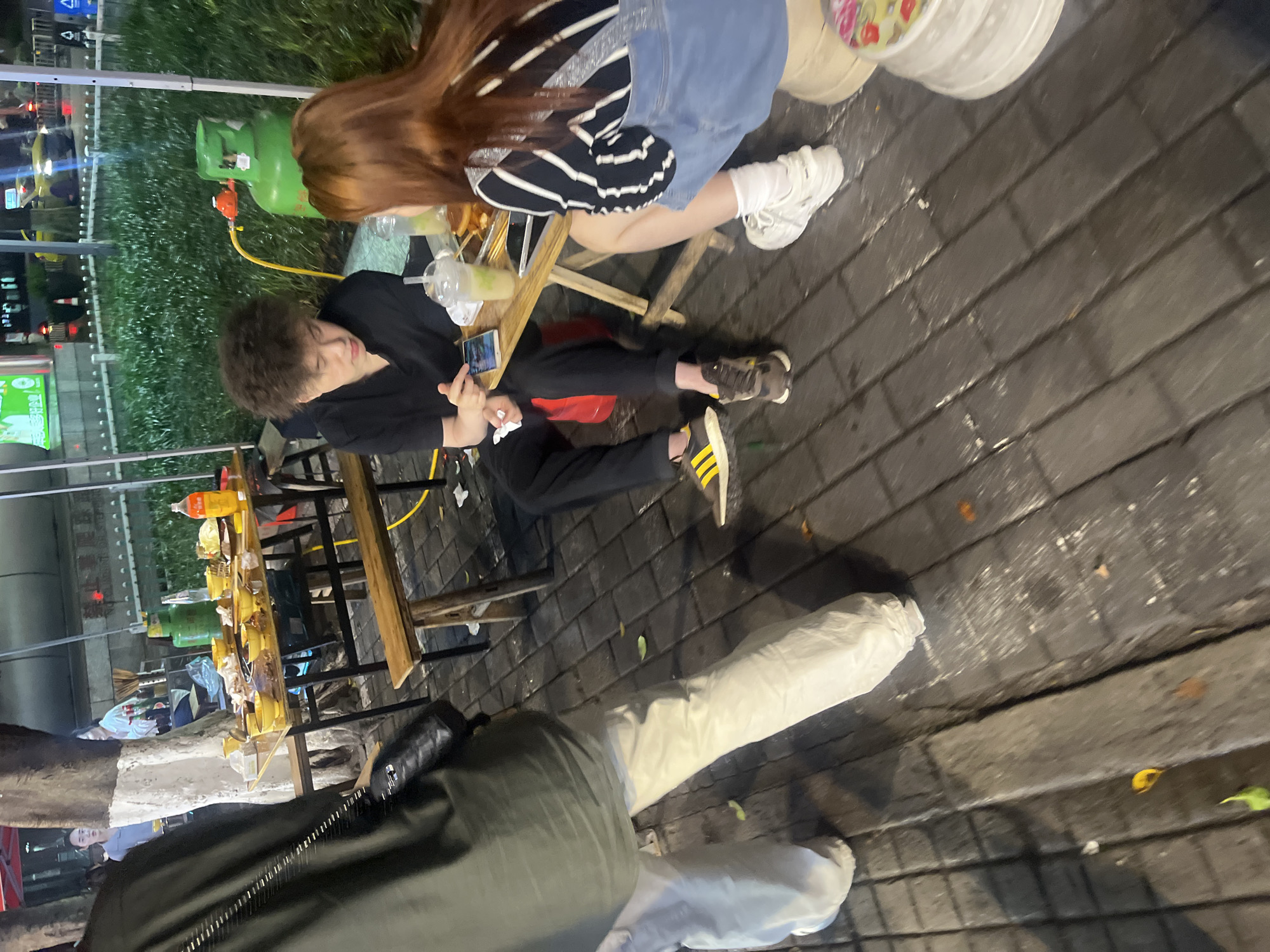 Evening urban life documented across Yuzhong District dining, transit areas