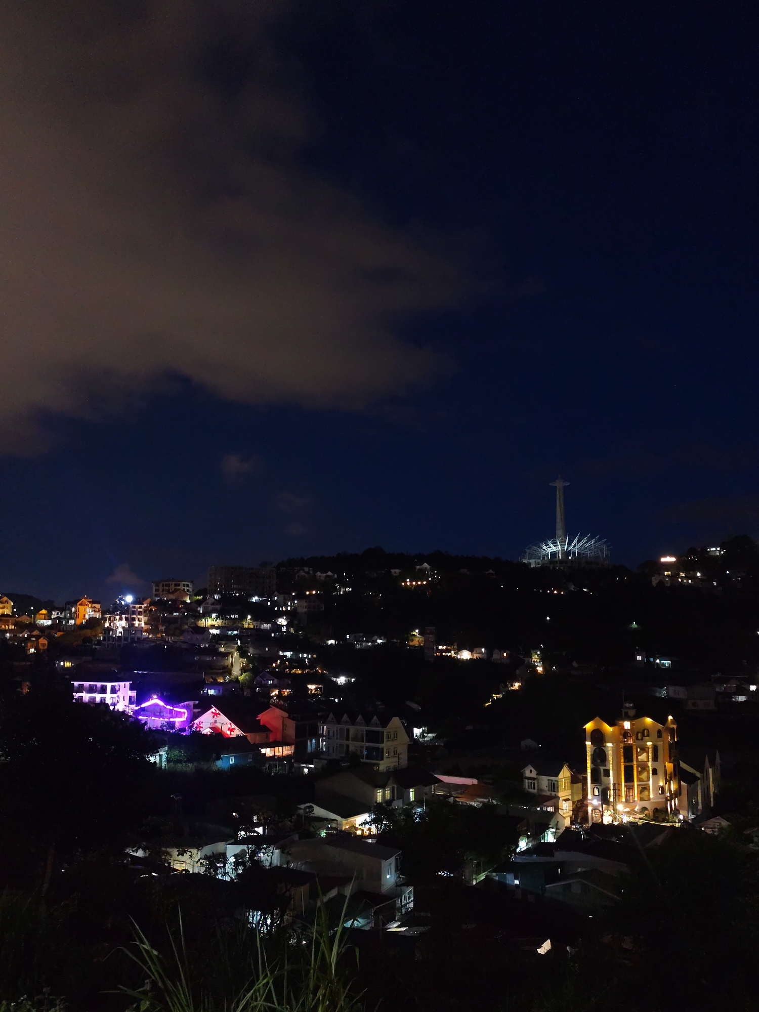 Nighttime views captured of Da Lat cityscape and Christ statue