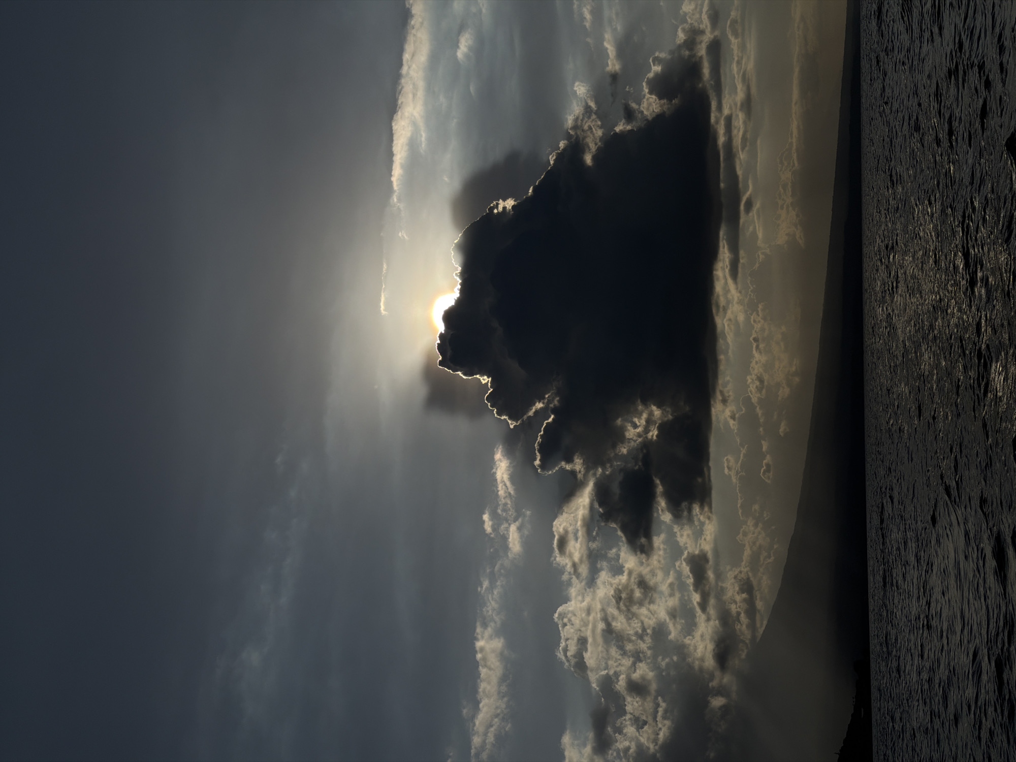 Dramatic backlit clouds photographed from boat off Indonesian coast