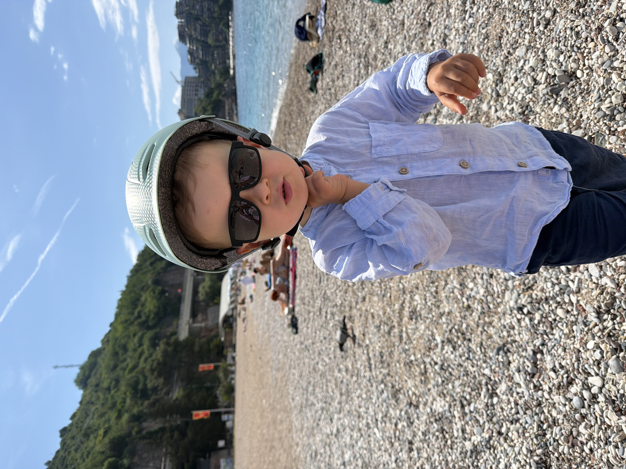 Child enjoys morning beach visit in Boreti, Montenegro