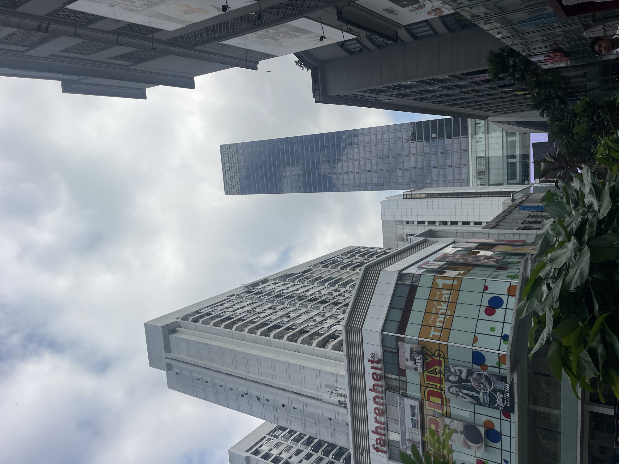 Street-level tour of Kuala Lumpur's commercial and skyline landmarks