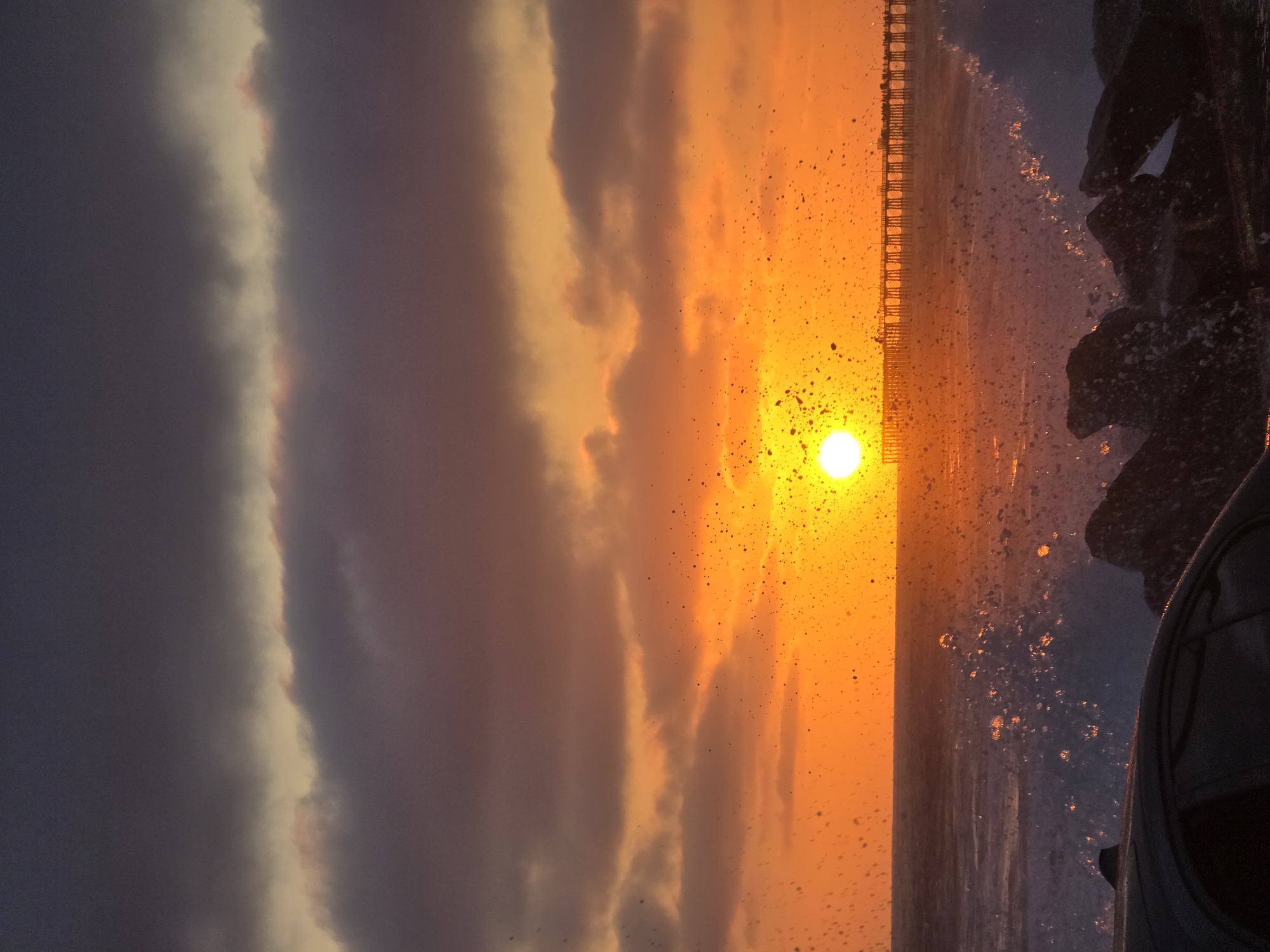 Sunset storm watching along Oceanside's coastline