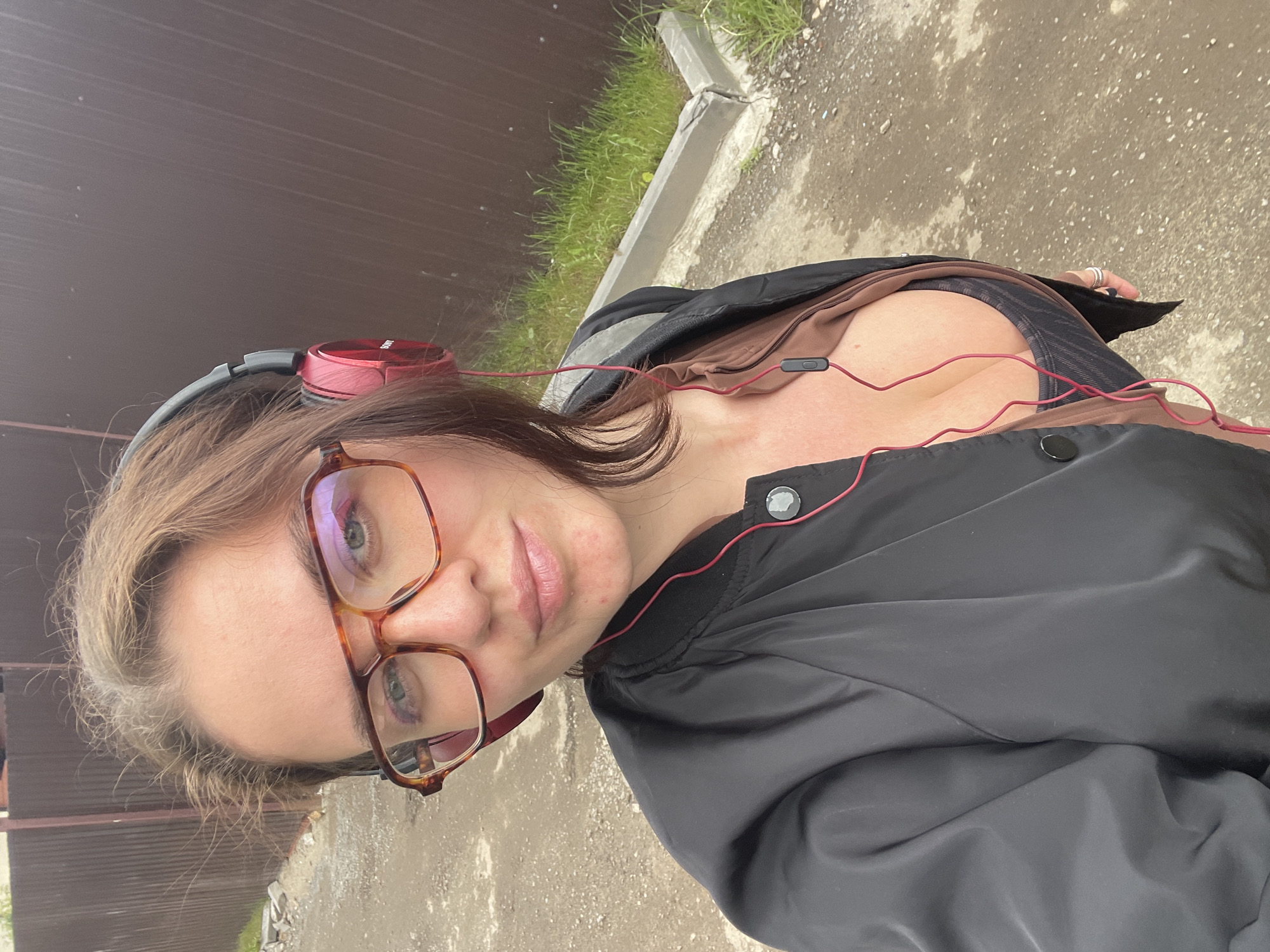 Woman takes playful selfies in Misaylovo residential area