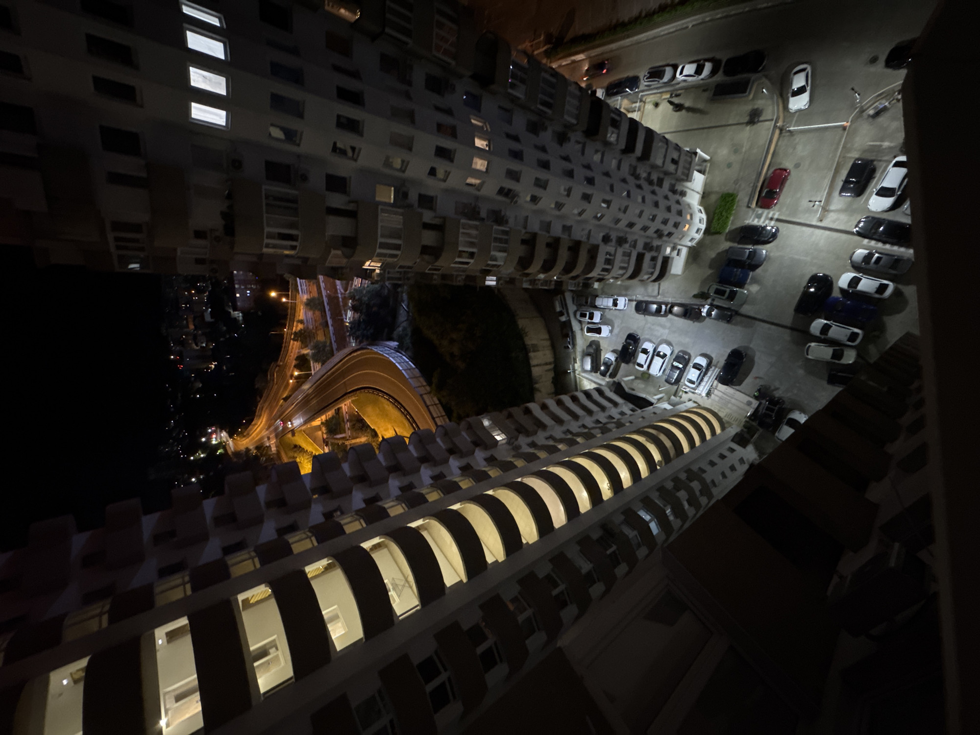Nighttime elevated highway documentation in Sochi residential district