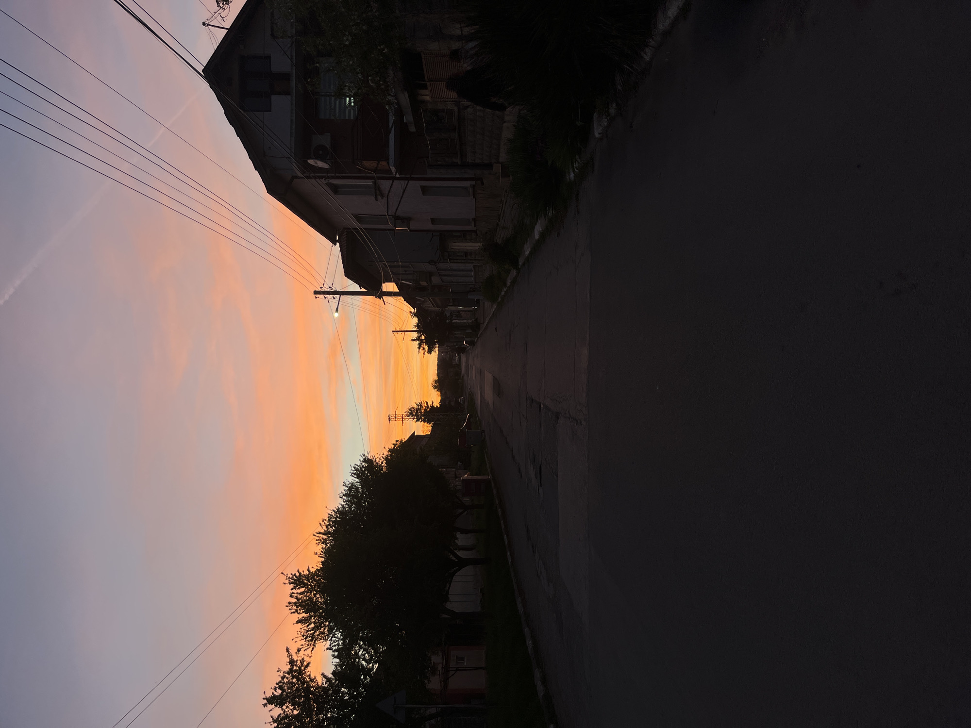 Colorful sunset captured on quiet street in Dibich, Bulgaria