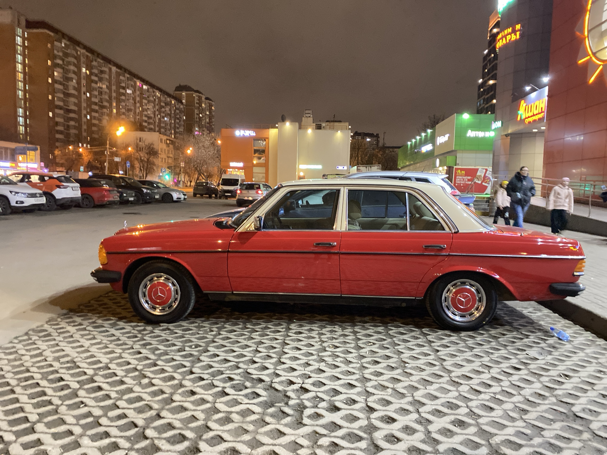 Vintage Mercedes spotted parked on Moscow sidewalk at night