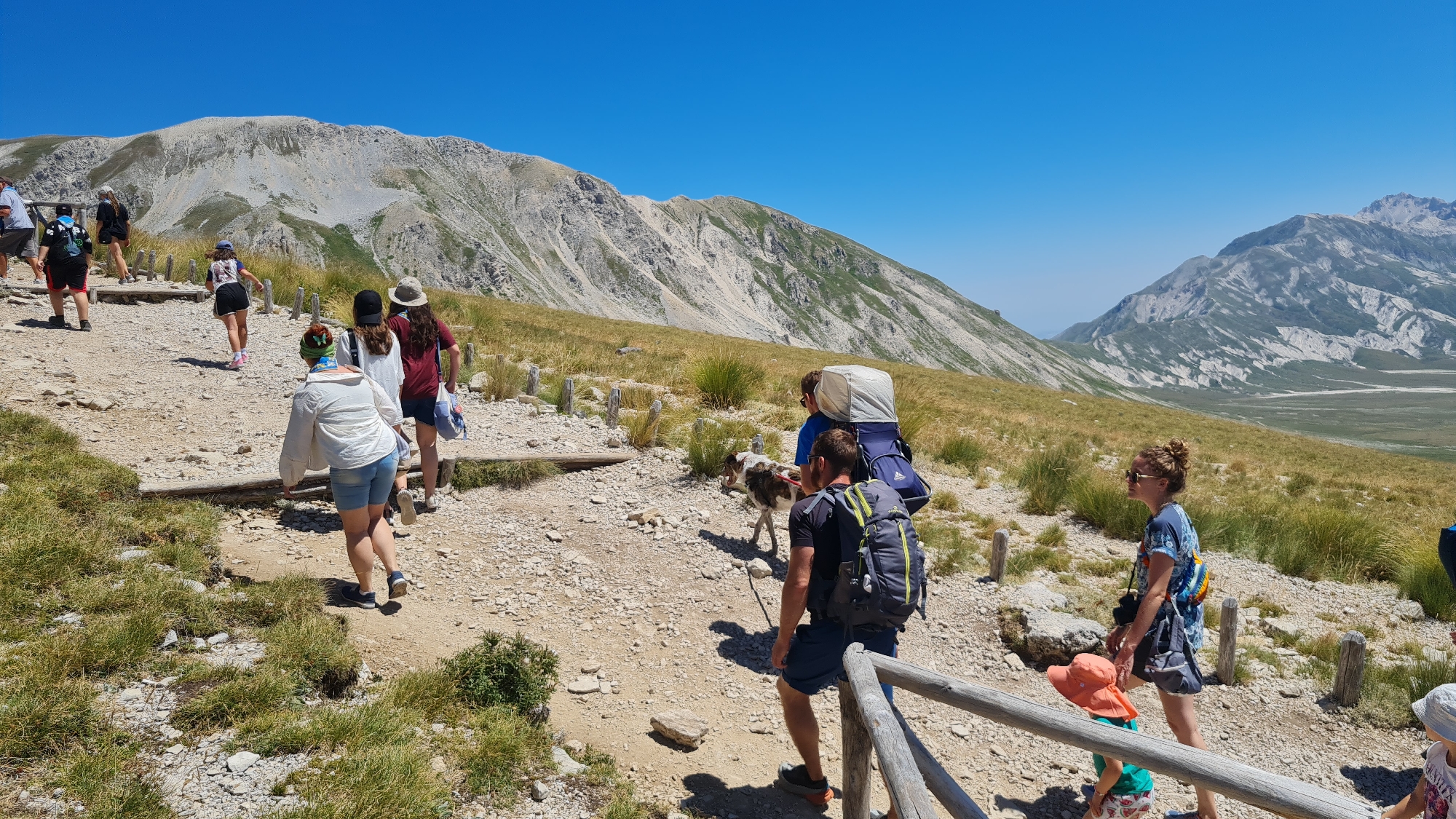 Scout hiking group on a mountain trail near L'Aquila