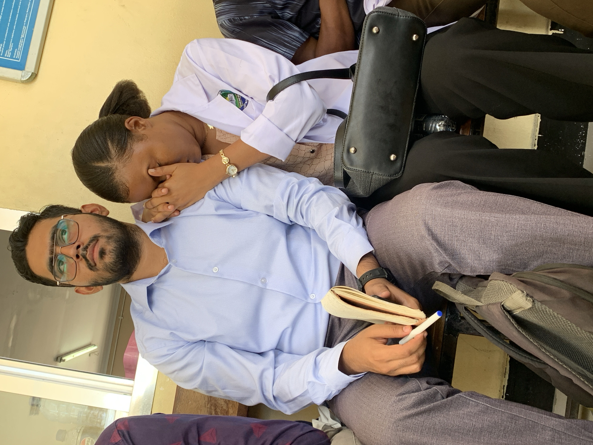 Quiet moments observed in Dar es Salaam: reading and medical care