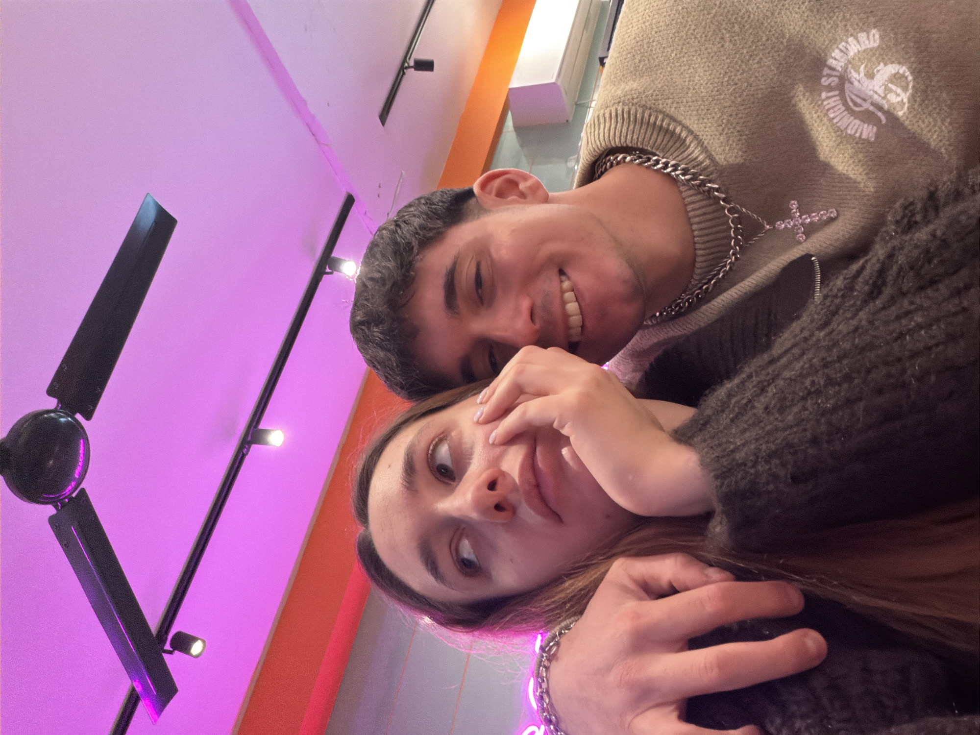 Young couple takes selfies during restaurant visit in Sofia