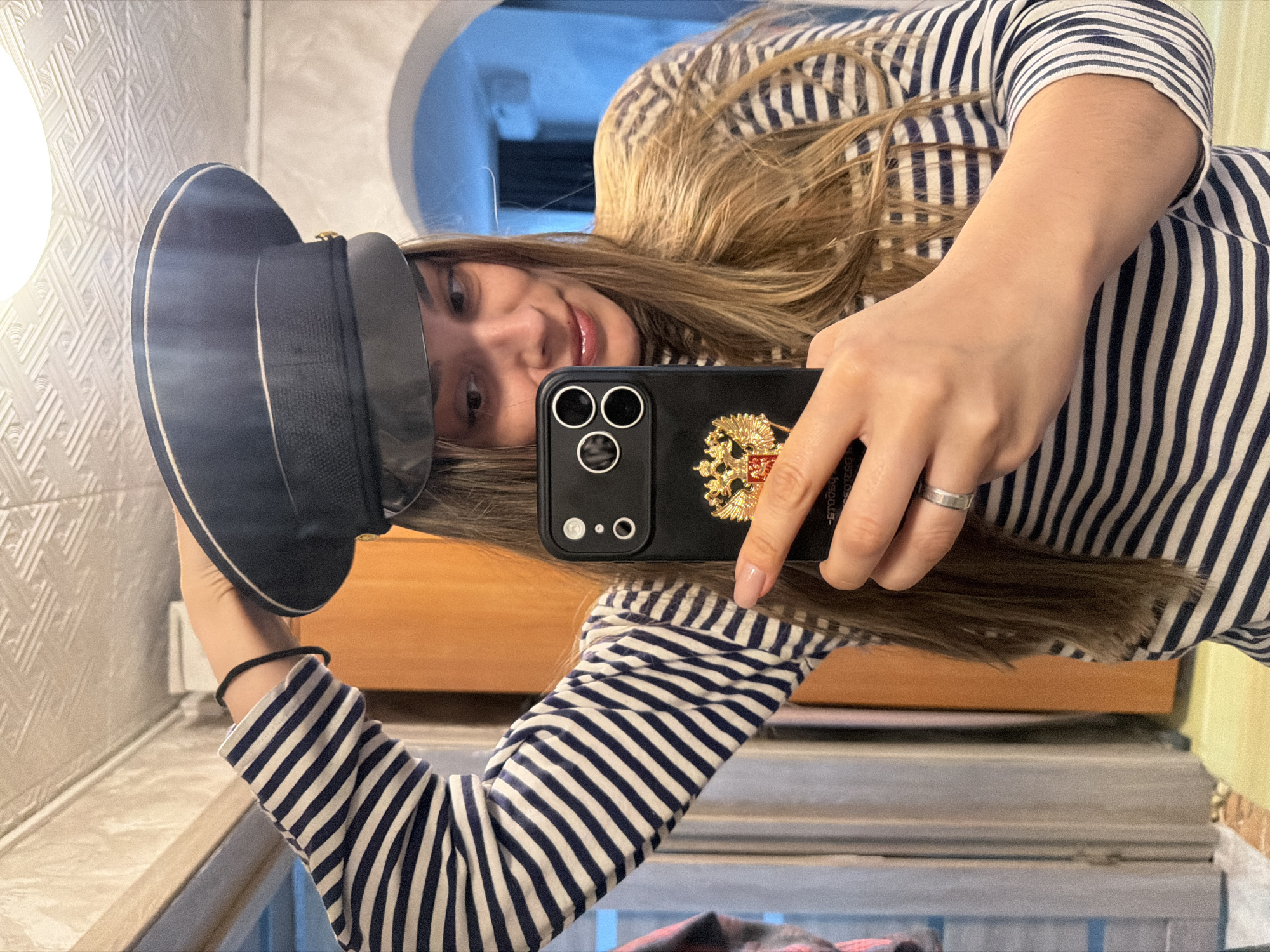 Woman documents morning routine through selfies in Sergeyevka, Russia
