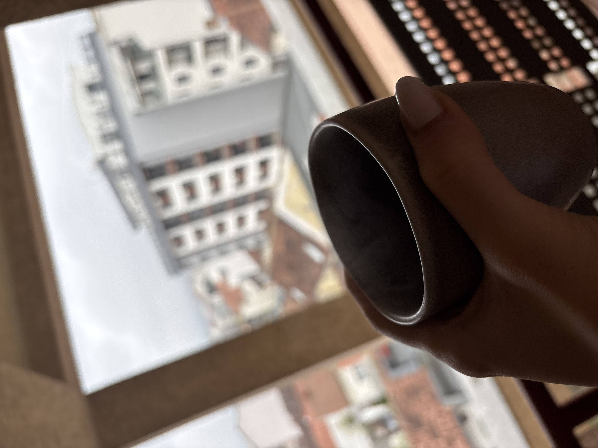 Morning coffee moment captured at window in Kragujevac