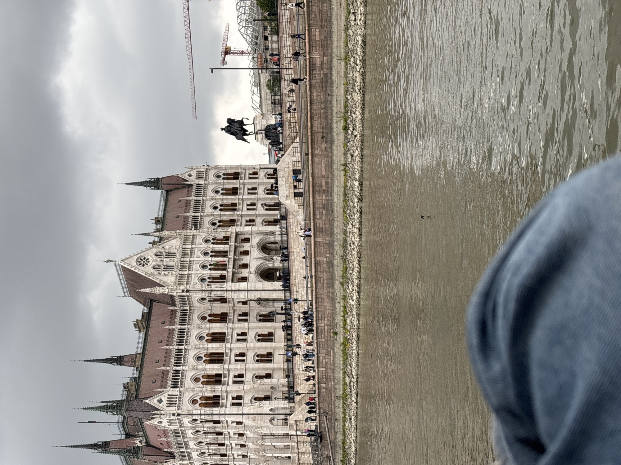 Tourist documents Budapest landmarks from Danube River boat tour