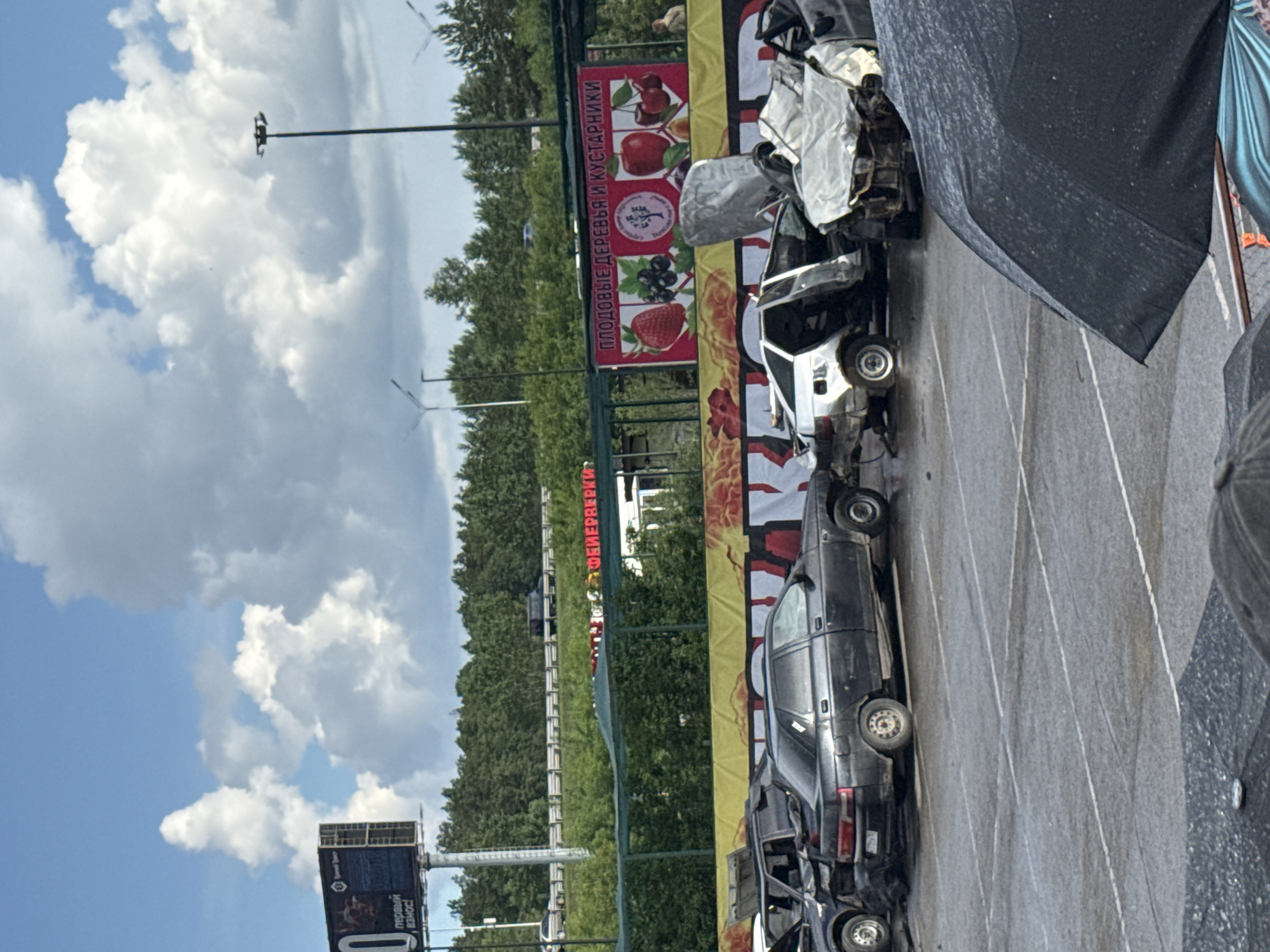 Outdoor automotive stunt show draws crowds of spectators