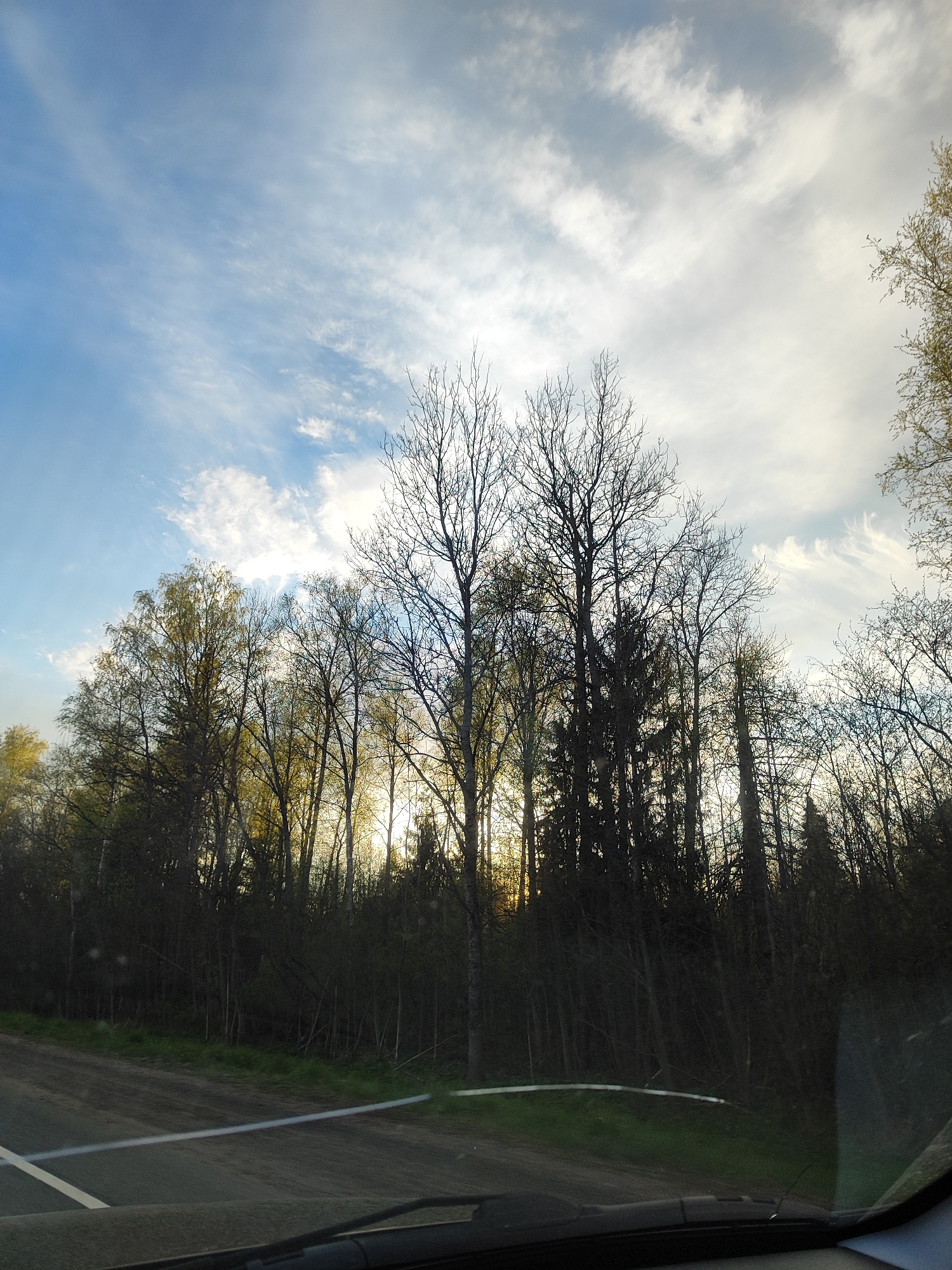 Driver Documents Roadside Sunset View During Evening Commute