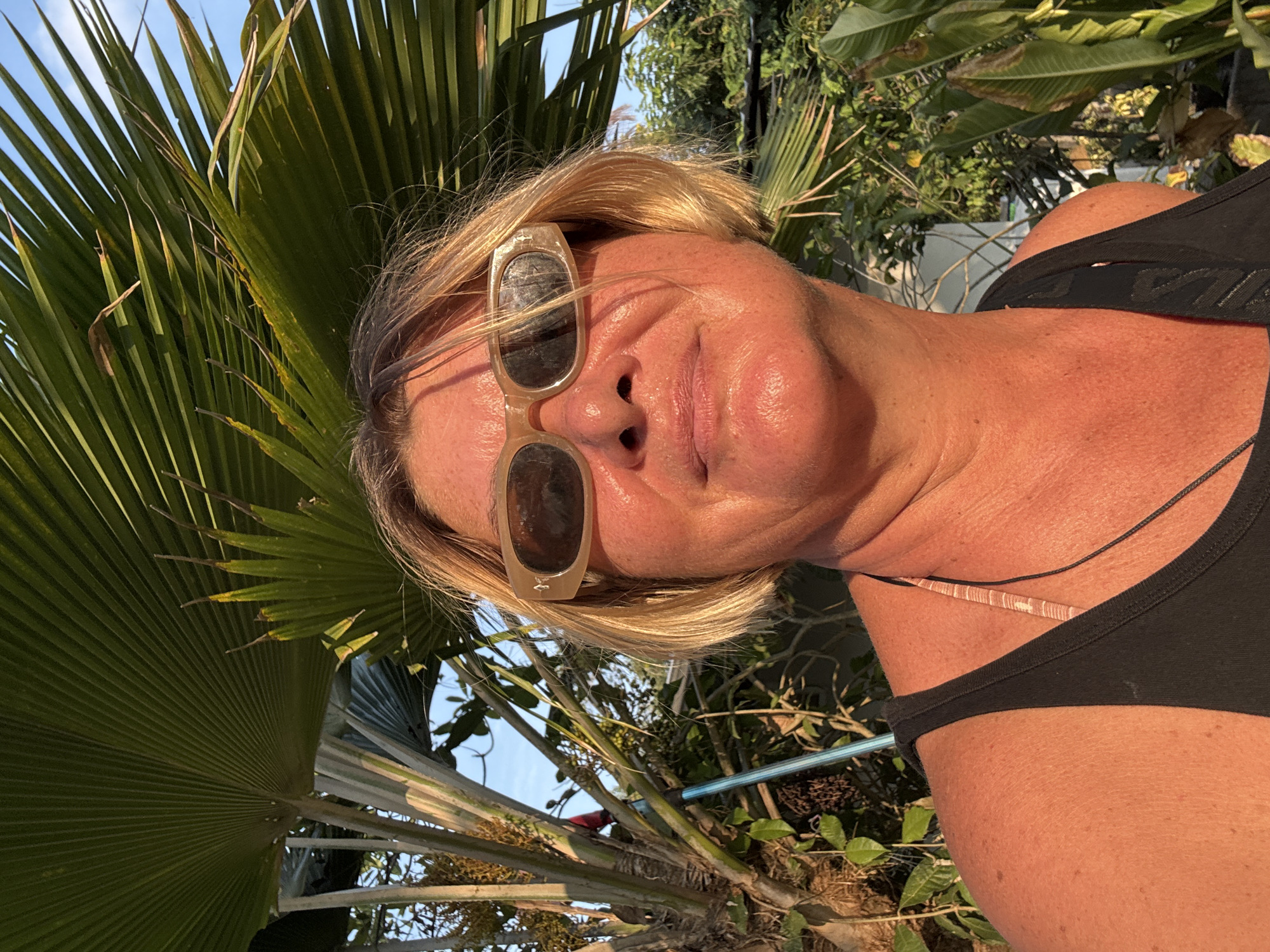 Tourist documents tropical garden resort experience in Thailand