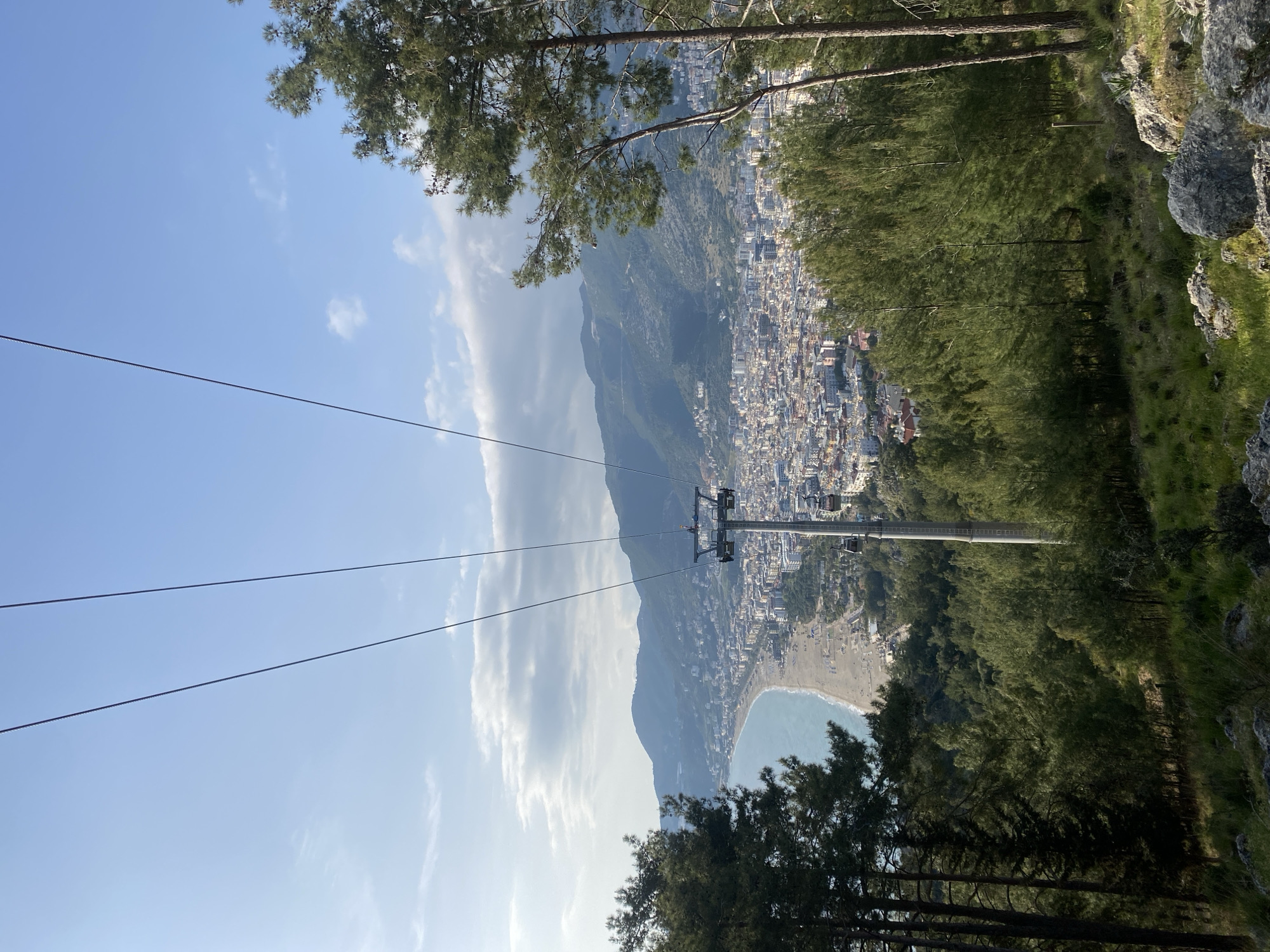 Cable car tour documents Alanya's coastal cityscape and mountains