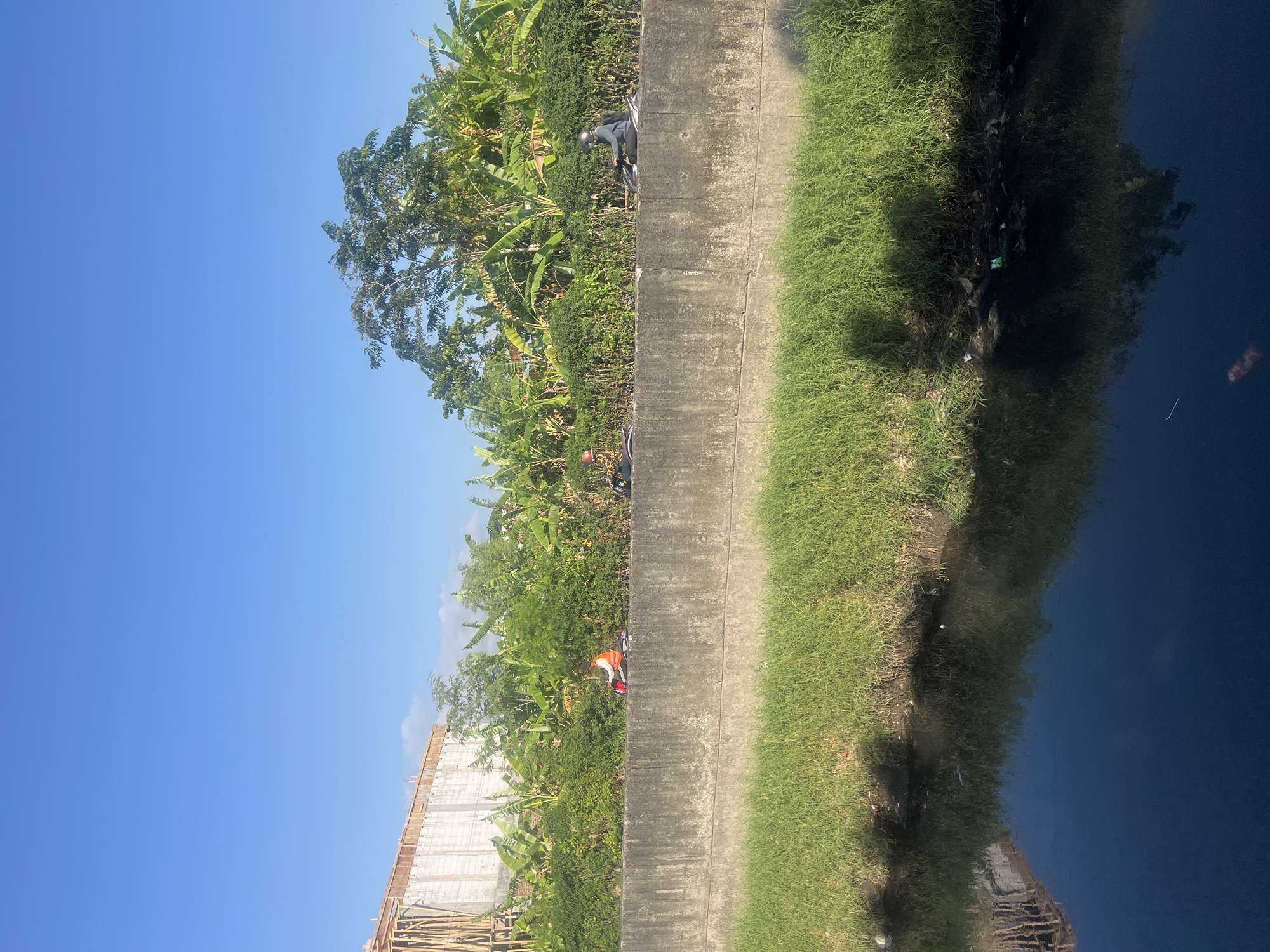 Early morning scenes captured along Denpasar canals