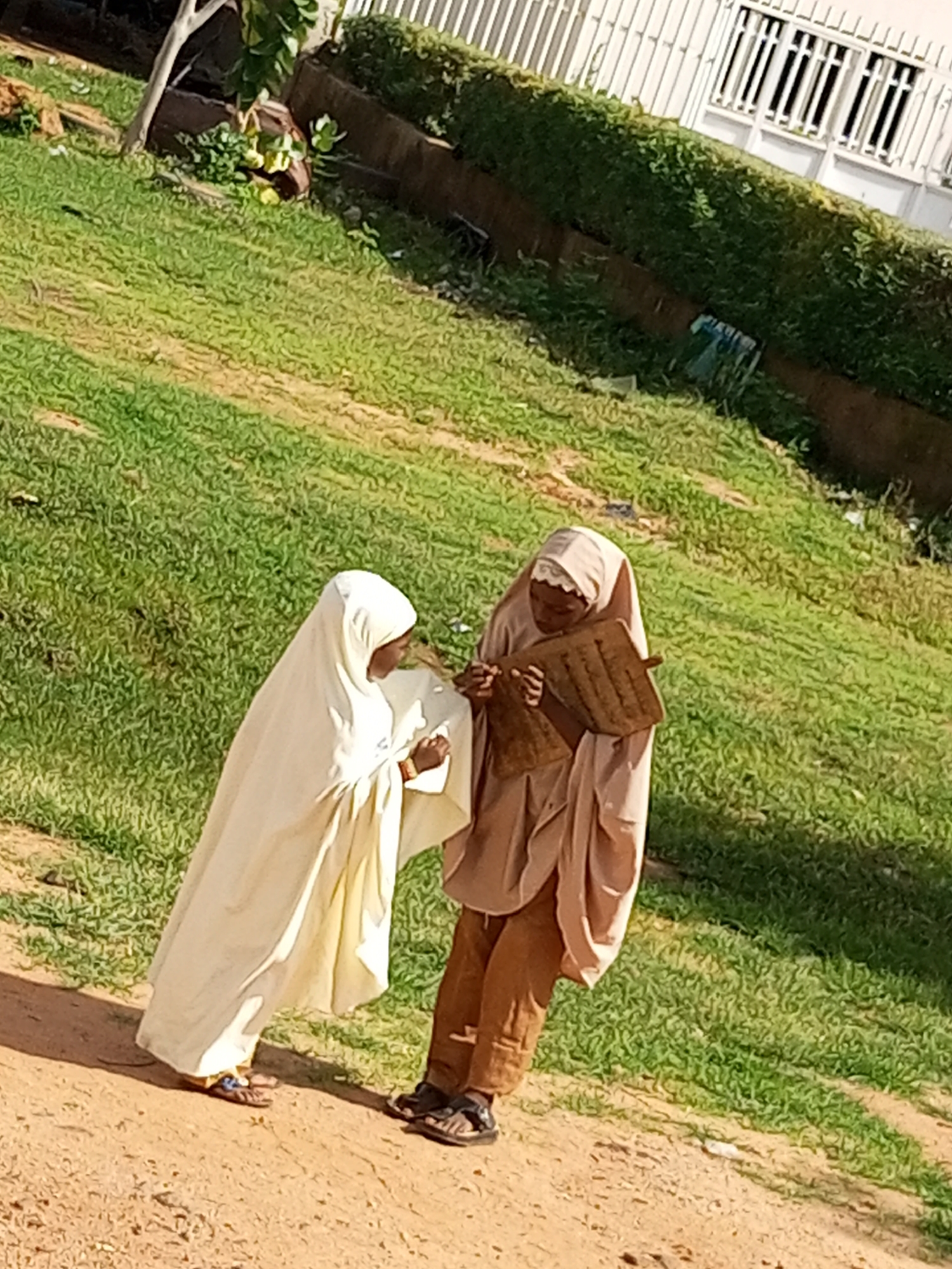 Everyday street life across three Nigerian towns, one afternoon.