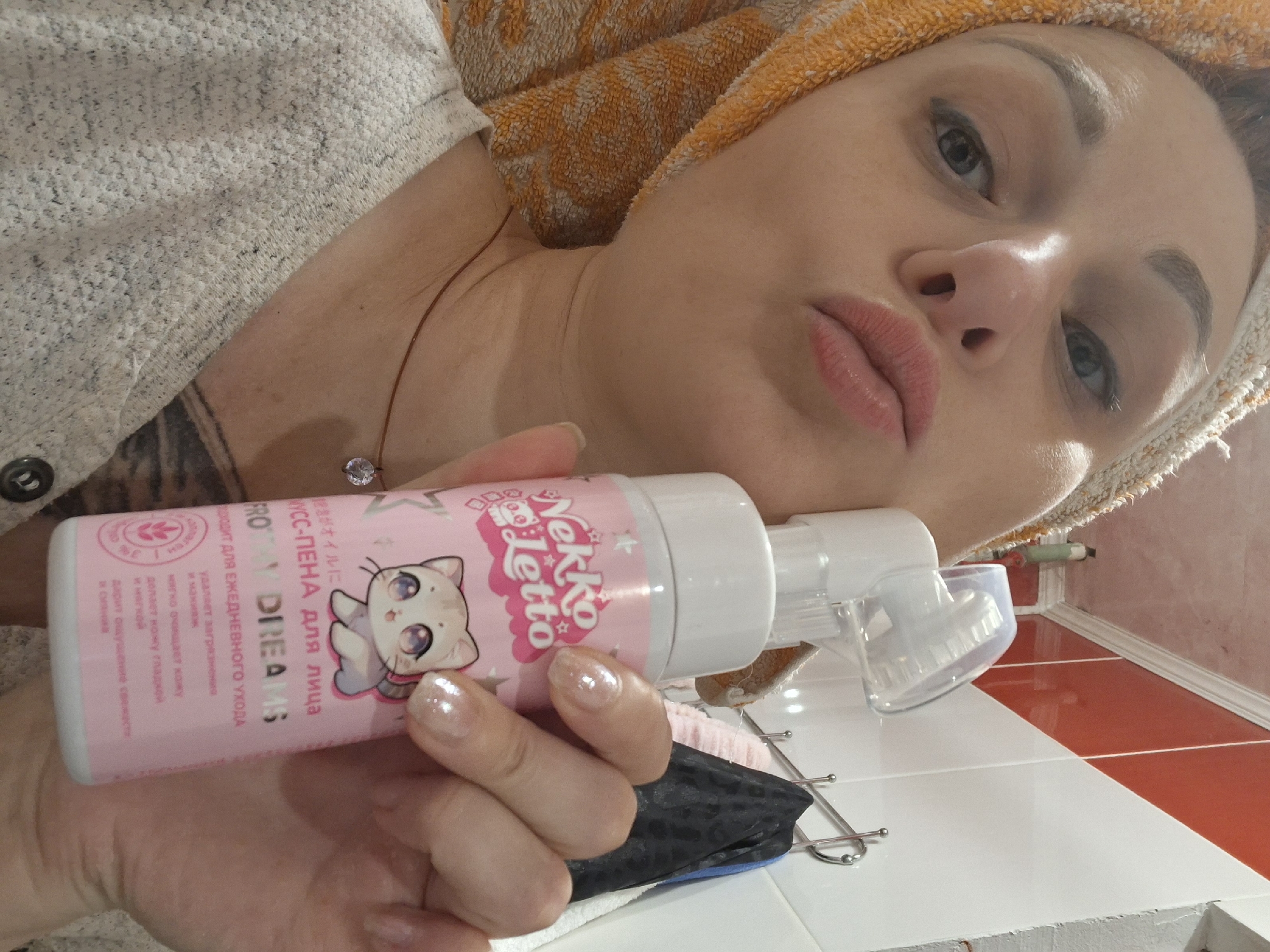 Skincare routine in a Belarusian bathroom, foam cleanser and mirror selfie