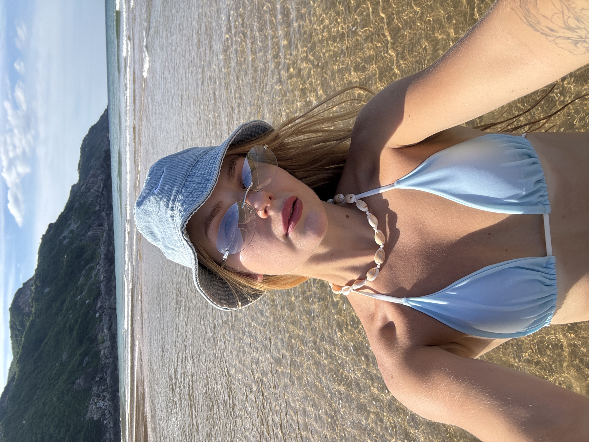 Beach day at Hoa Xuan with coastal lighthouse views