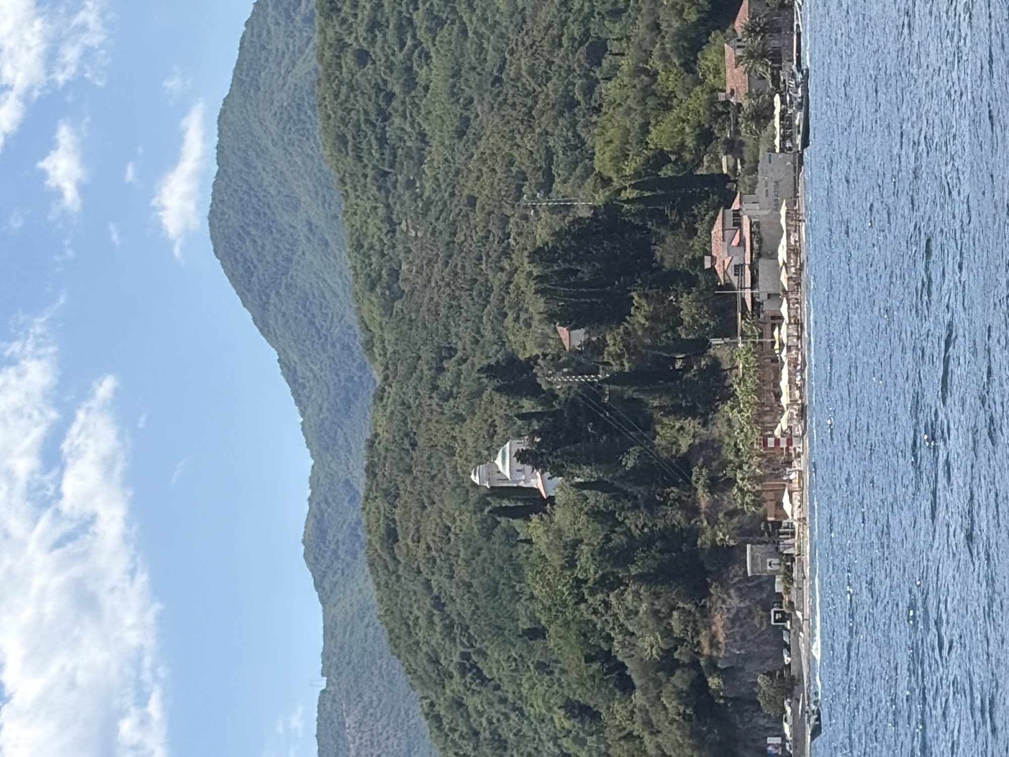 Lazy summer afternoon on a Bay of Kotor pebble beach