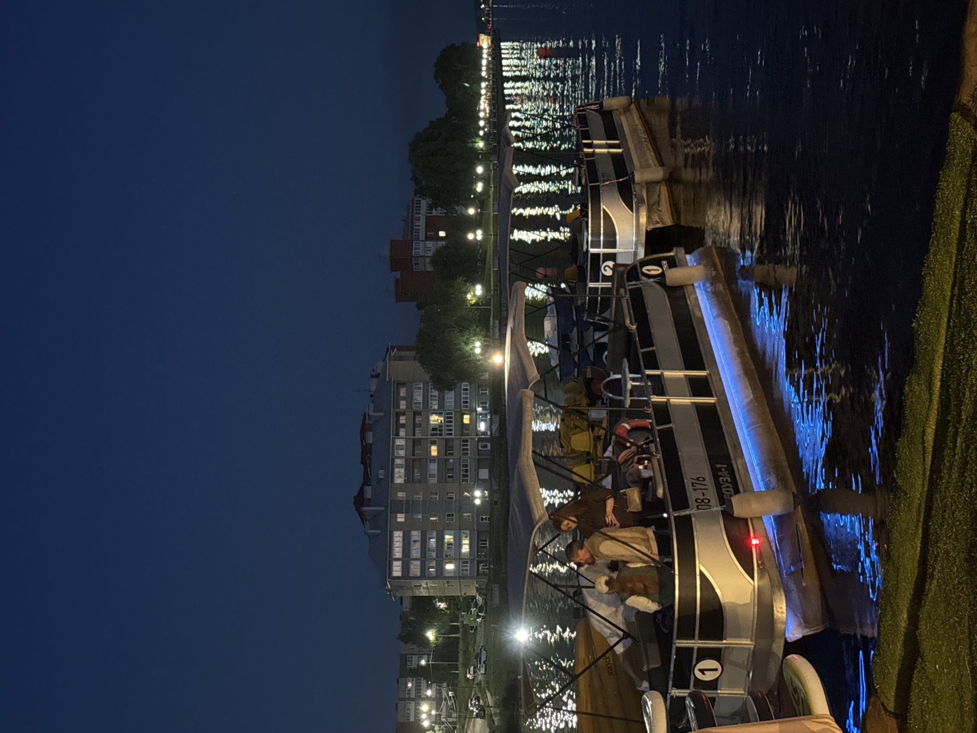 Evening waterfront activities and personal moments documented in Votkinsk