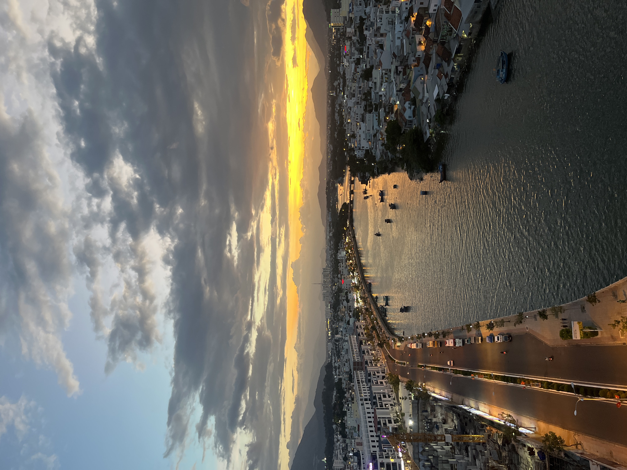 Sunset documented over cloudy sky in Nha Trang Ward