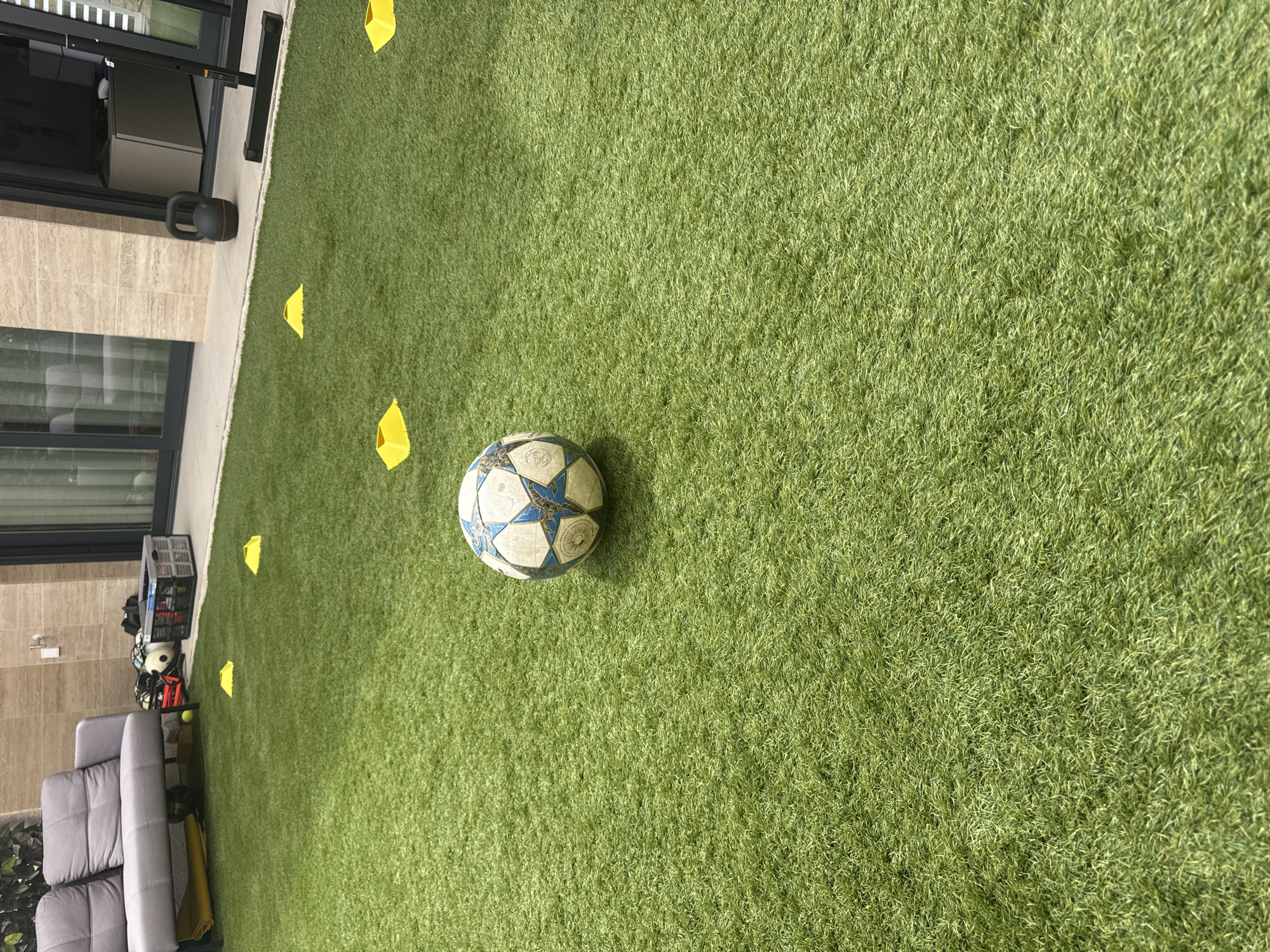 Backyard soccer and fitness setup on artificial turf in Finestrat