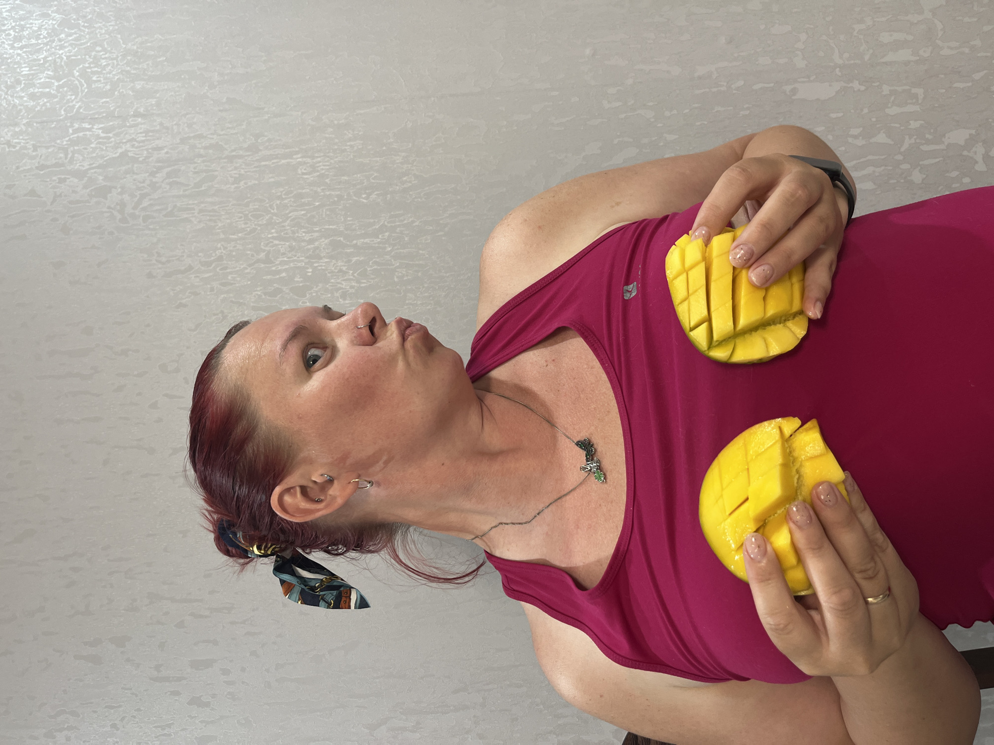 Woman poses with mangoes, cat spotted in Chaikovsky home