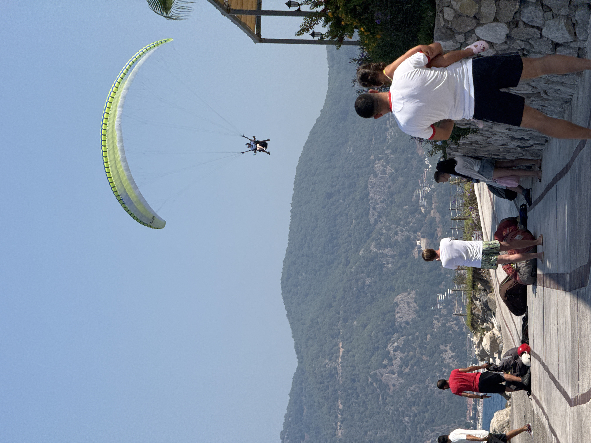 Paragliding and crashing waves along the Fethiye coast
