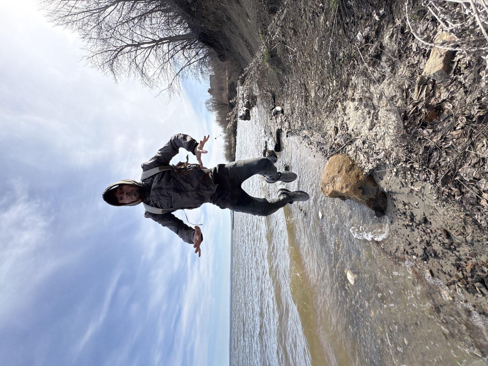 Two people photographed along waterfront in Ulyanovsk, Russia