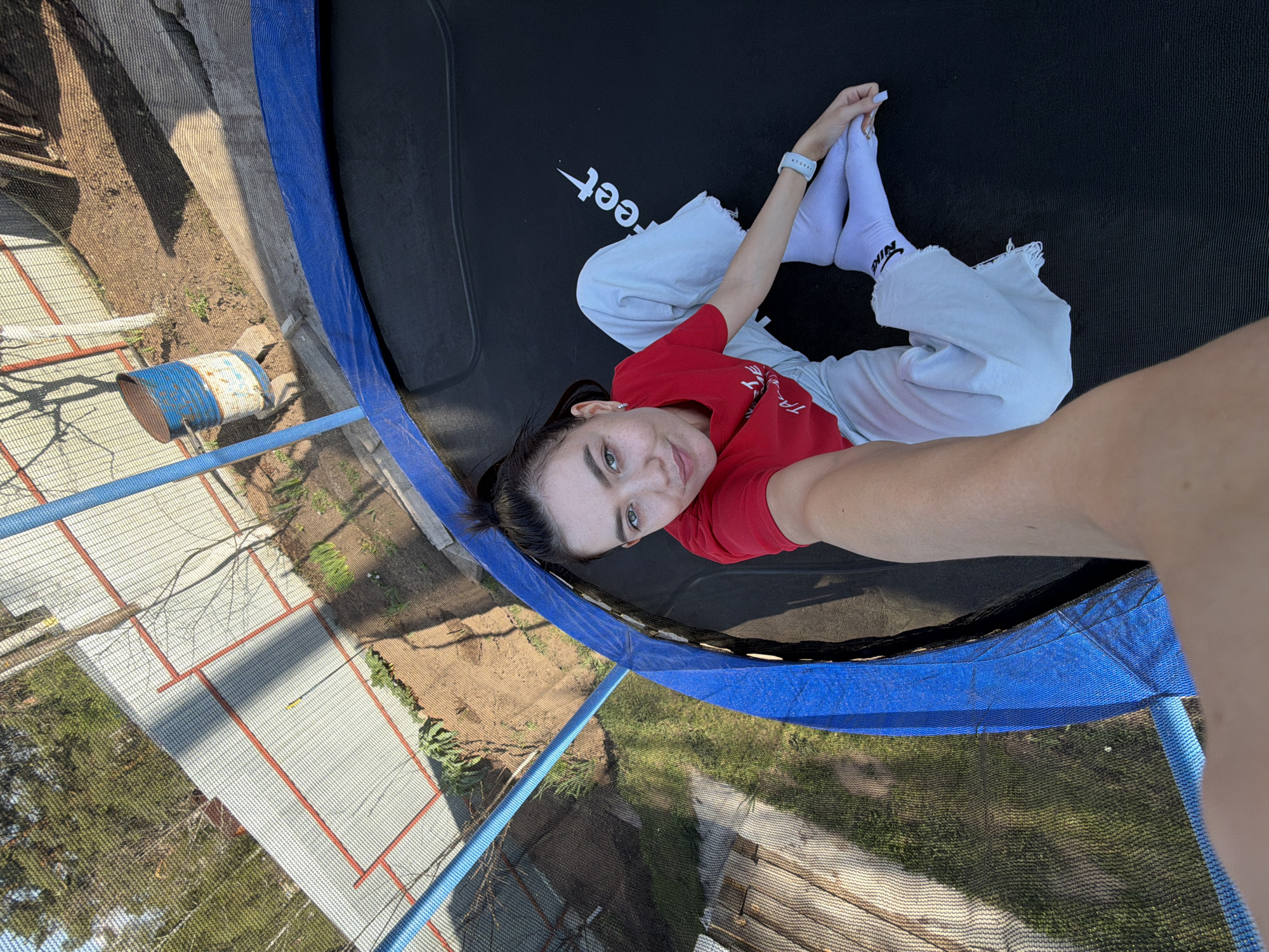 Woman takes selfies on trampoline in Chaikovsky, Russia