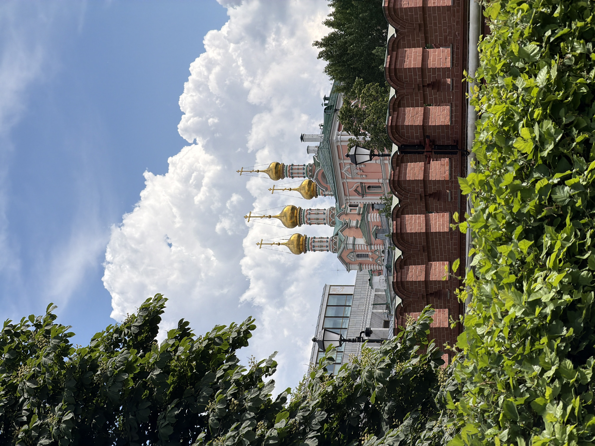 Orthodox church and decorated park documented in outdoor scenes