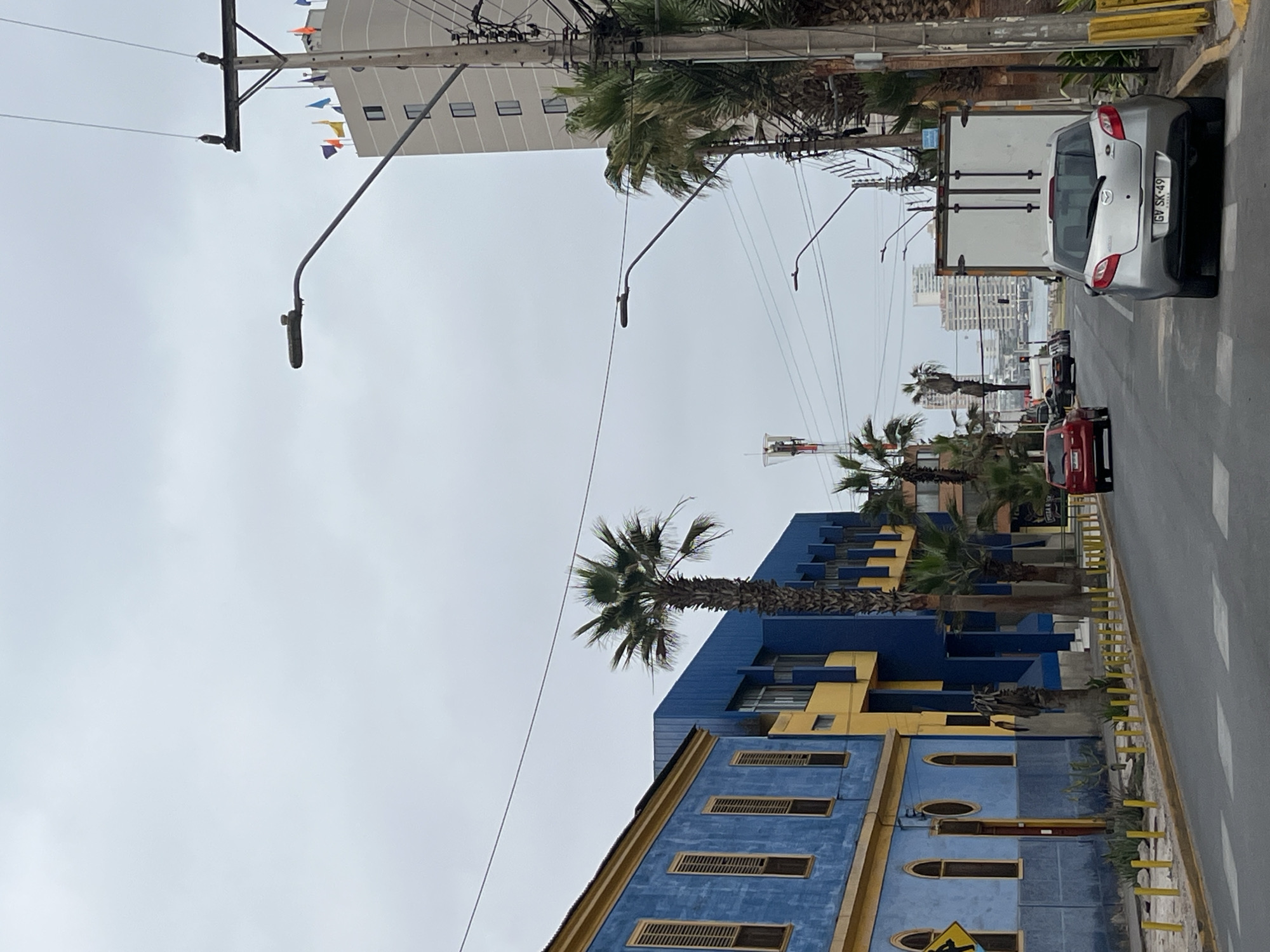 Iquique's colorful blue church on a cloudy afternoon