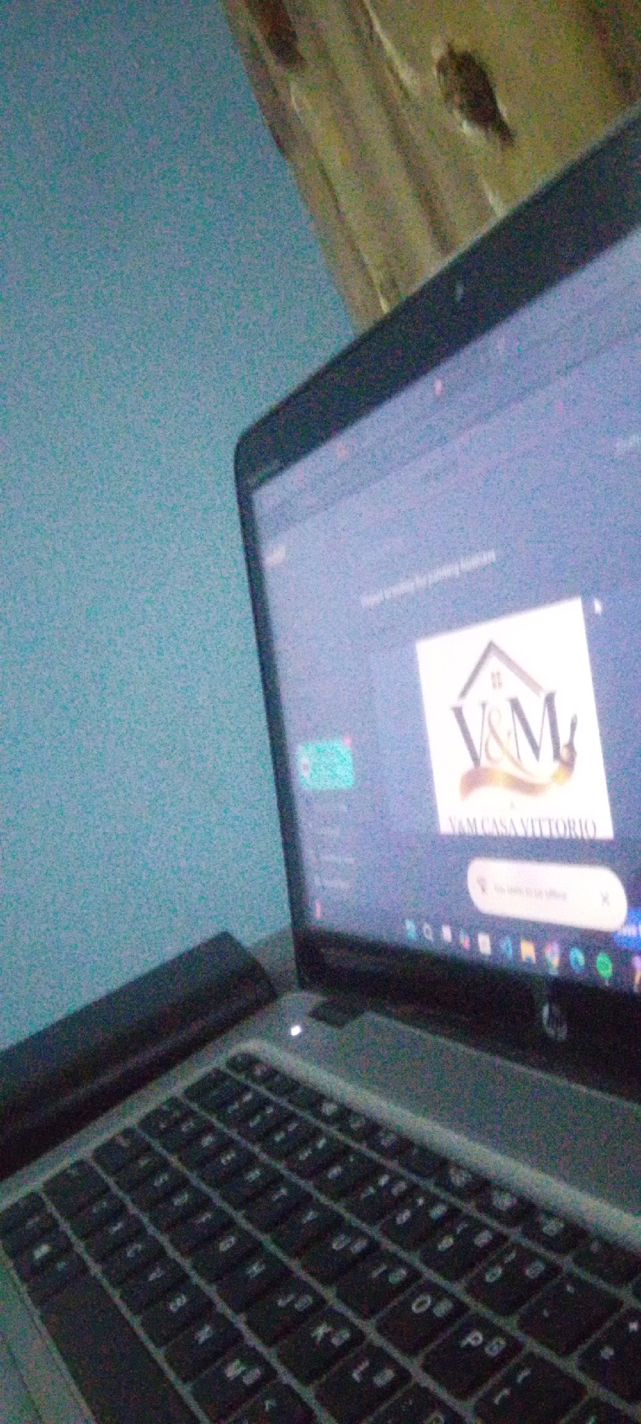 An evening indoors: a laptop, a tucked phone, a casual selfie