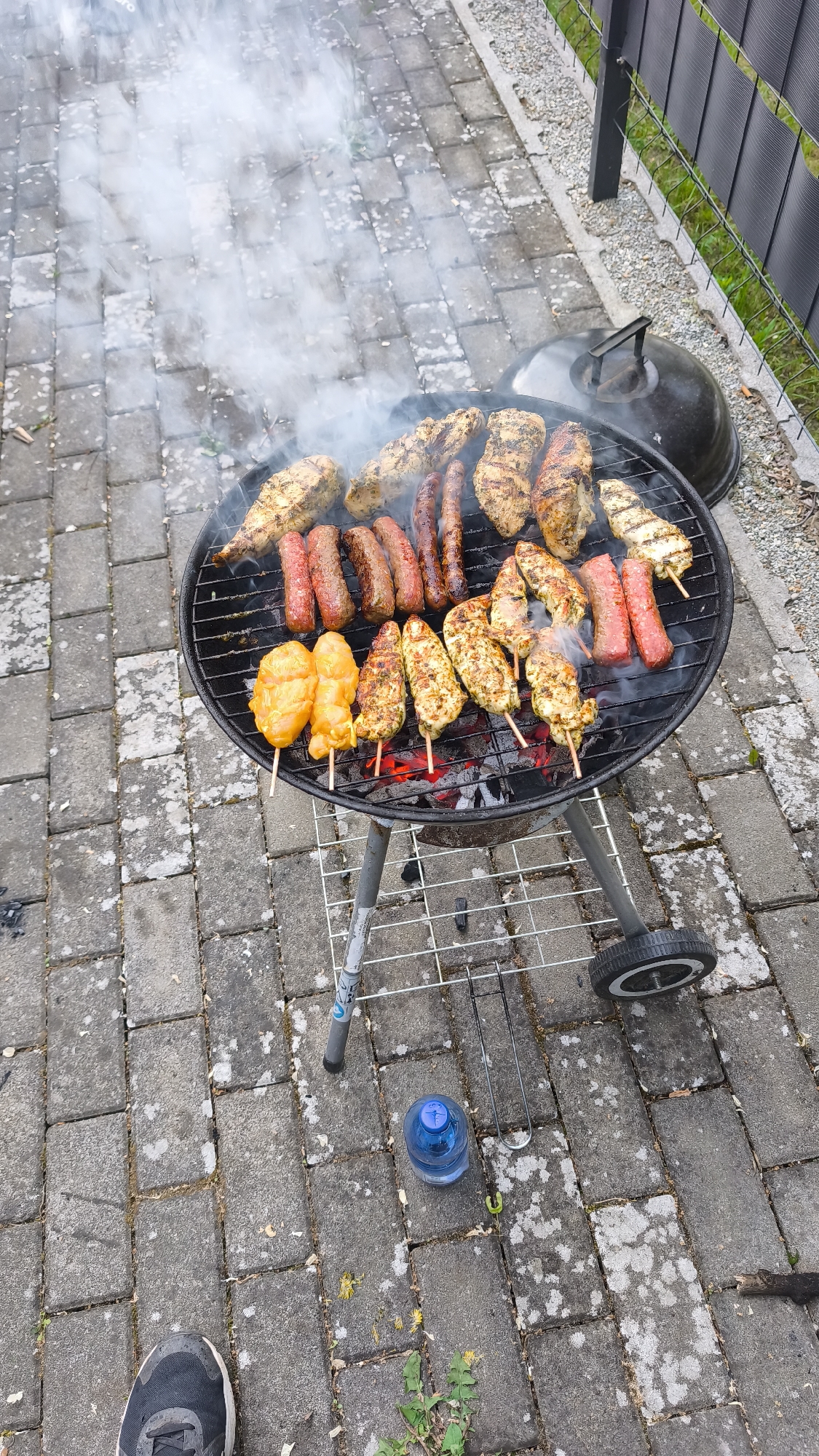 Backyard barbecue gathering documented through evening hours June 6