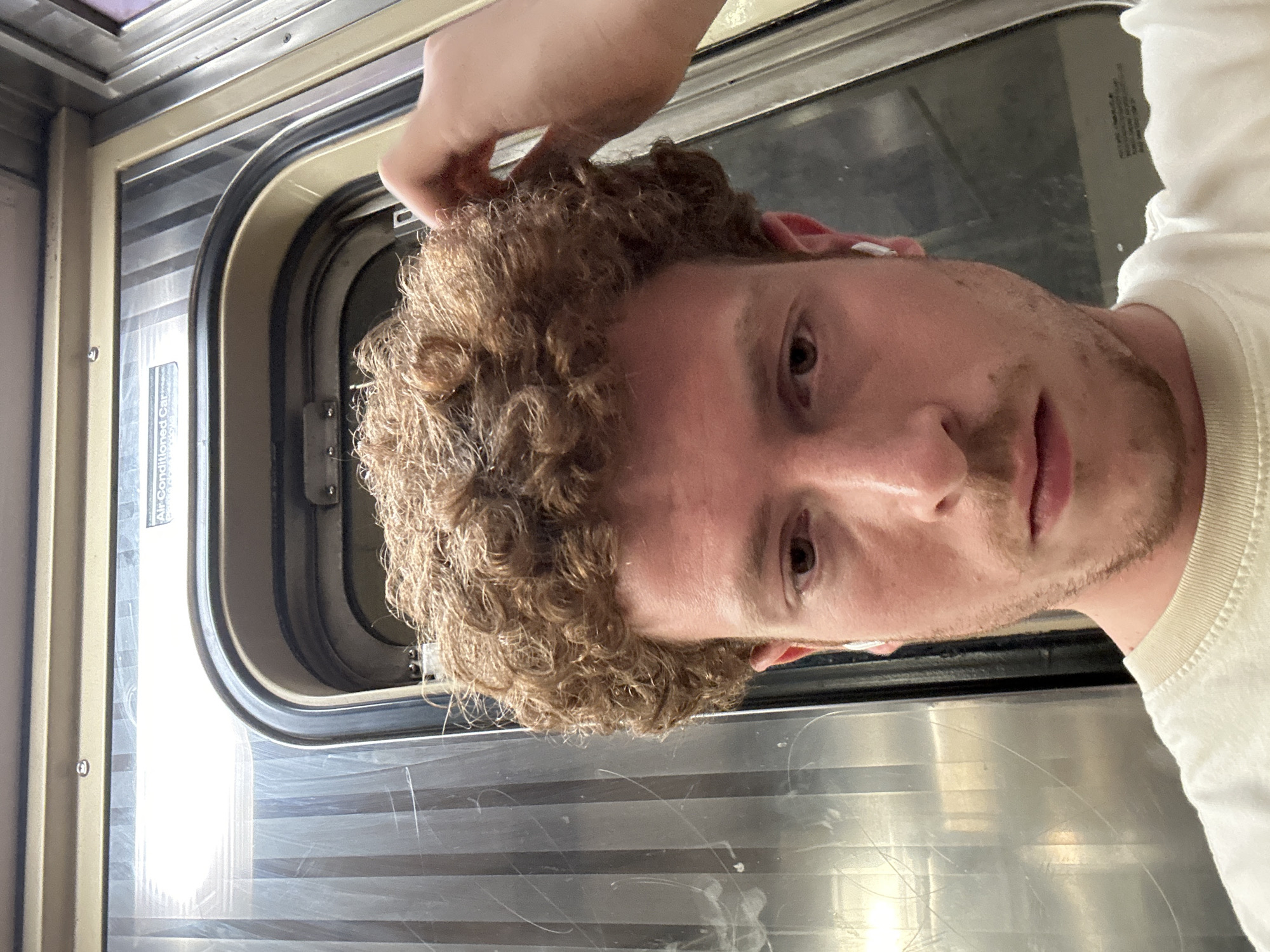 Man takes selfie on New York subway car