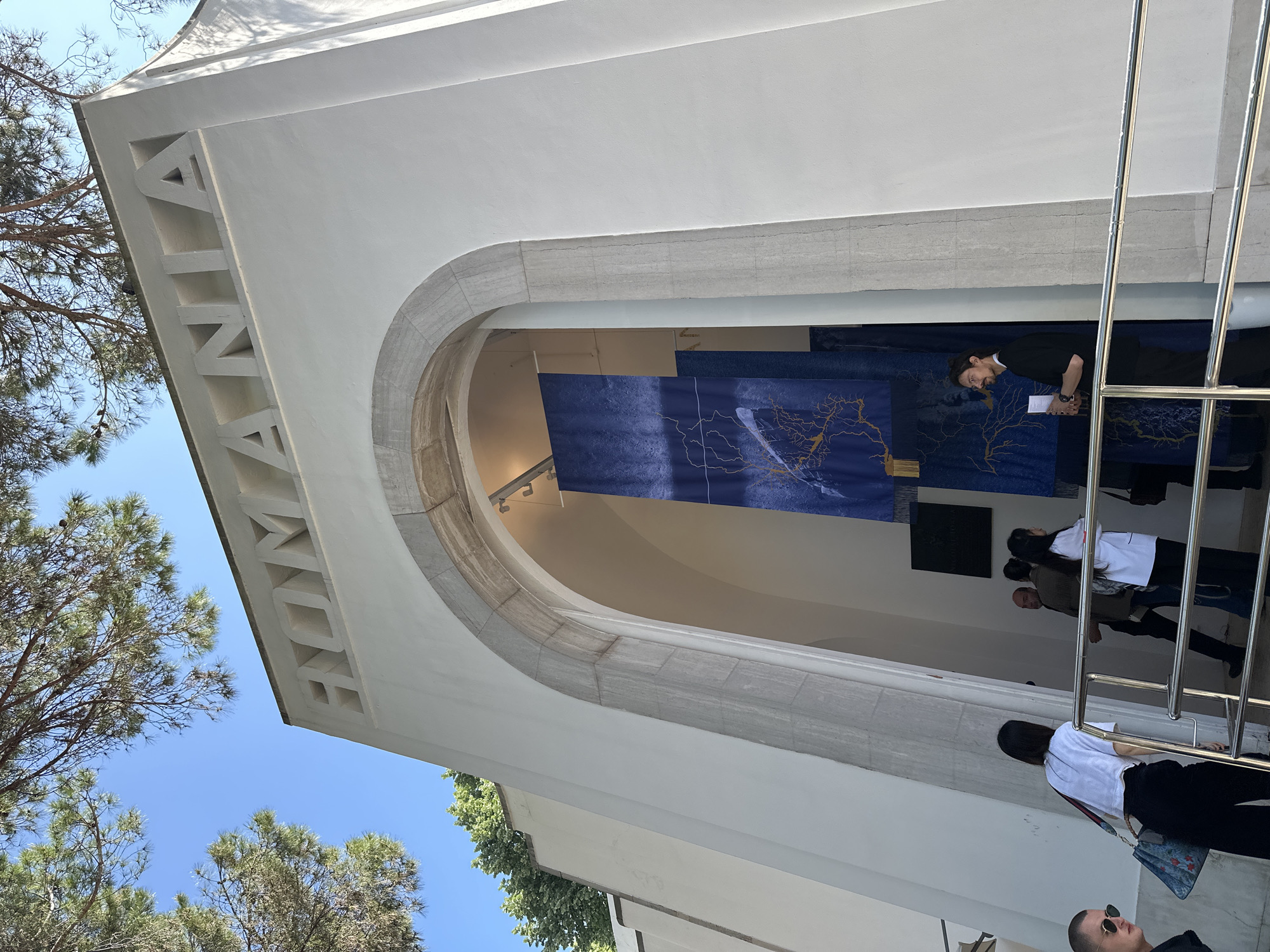 Visitor tours Venice Biennale pavilions and contemporary art installations