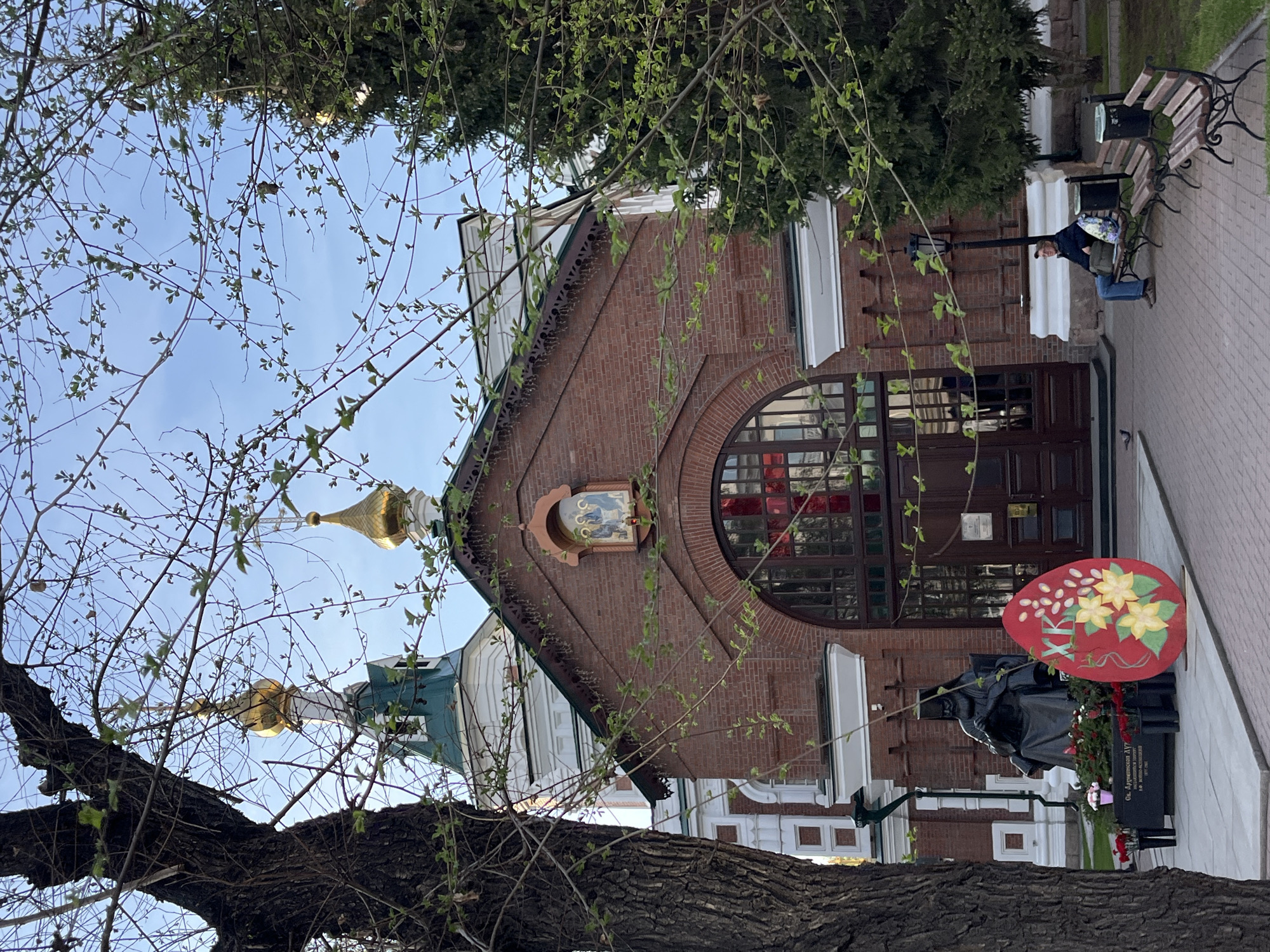 Urban scenes documented: church, reflection, buildings in neighborhood