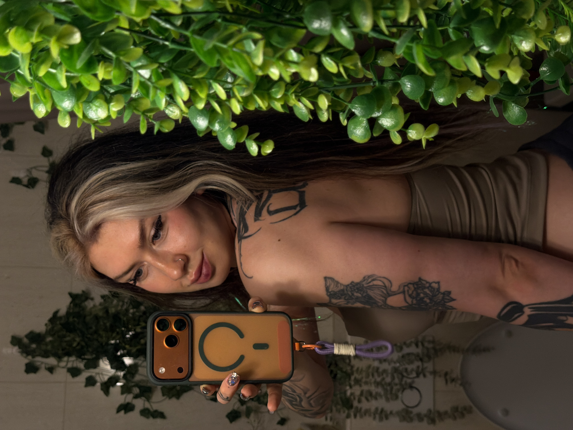 Woman takes bathroom selfies in Budva, Montenegro