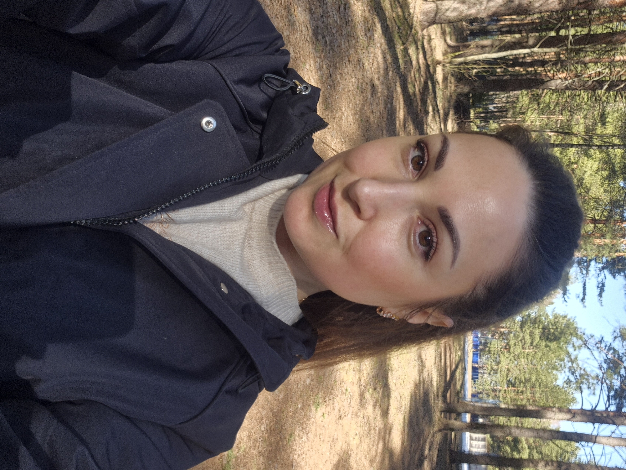 Forest visitors document nature walk with selfies and scenery