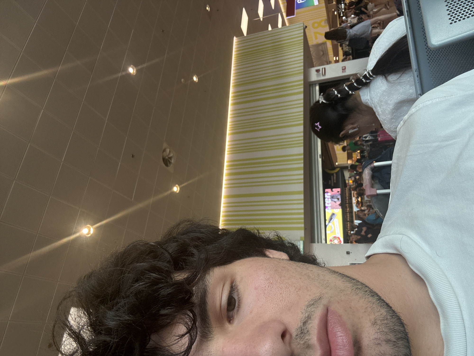 Passing time at Bergamo's Orio al Serio Airport on a summer evening