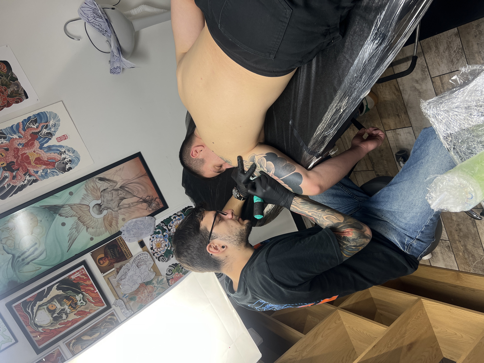 Tattoo artist works on customer in Sofia studio