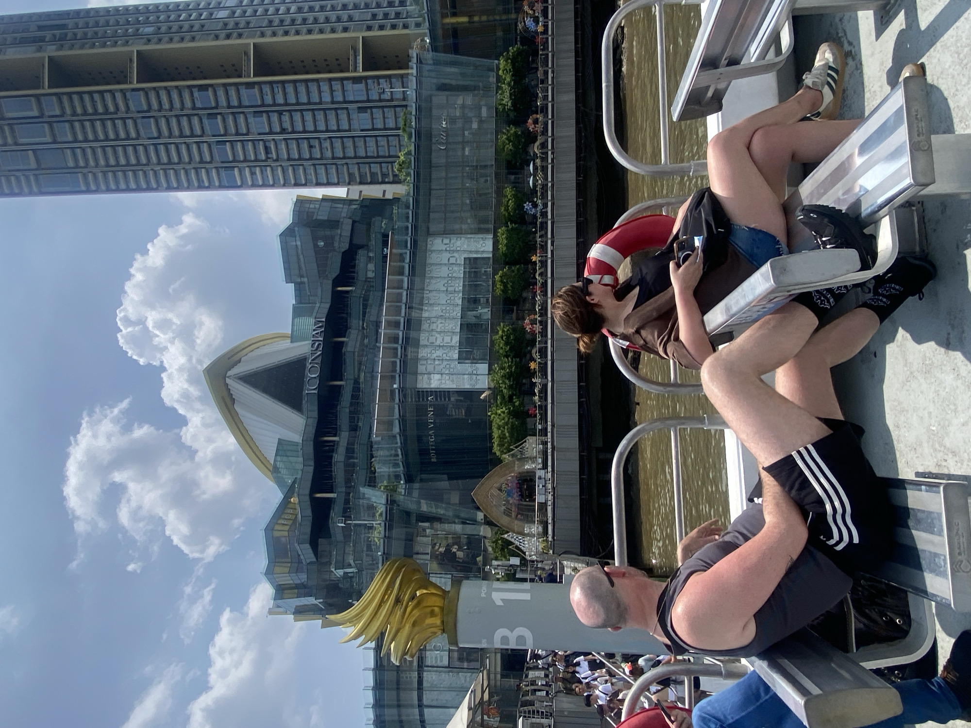 River boat passengers view Bangkok's ICONSIAM mall from Chao Phraya