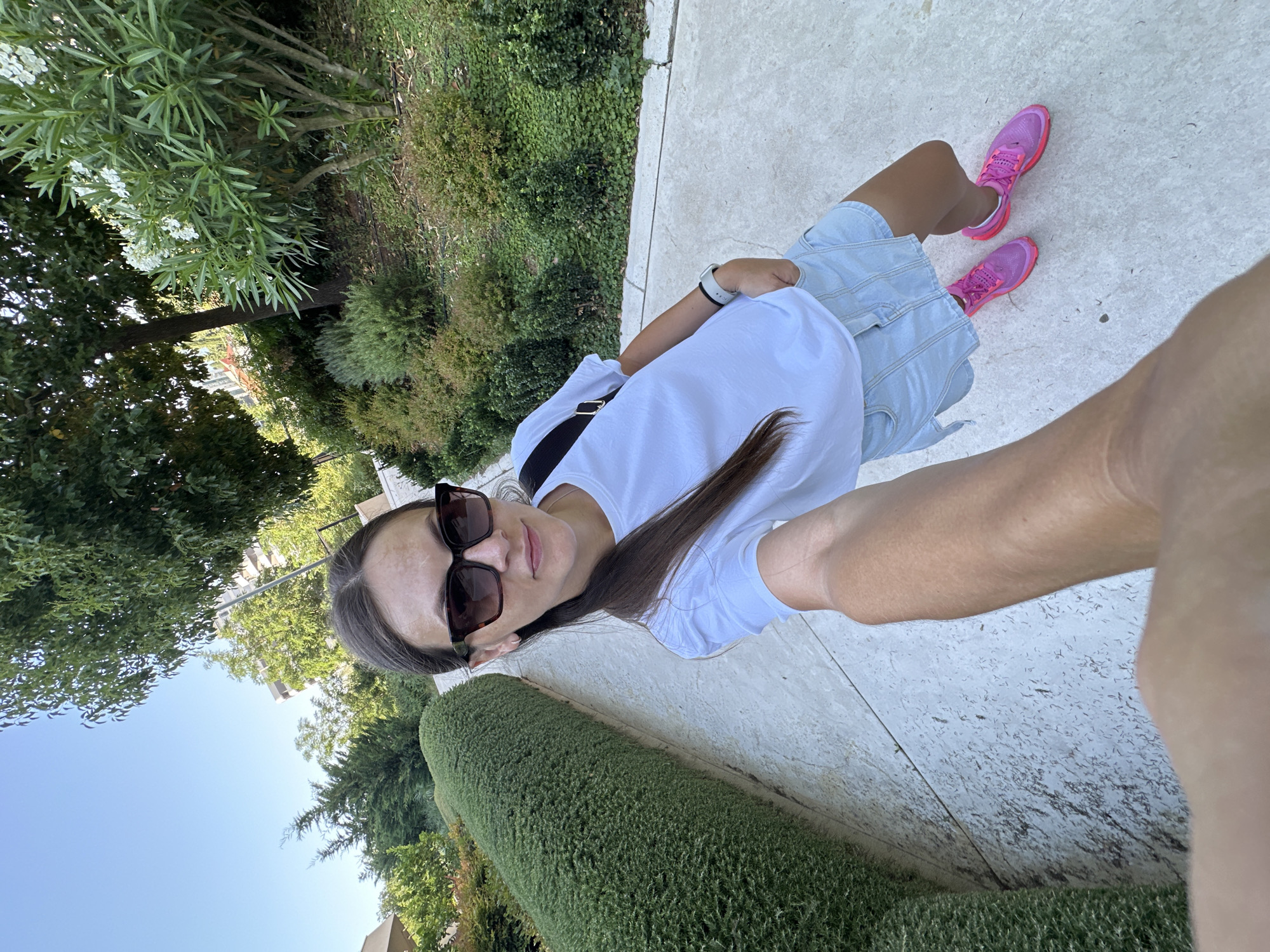 Selfie series on a sunny Bečići walkway, oleander in bloom